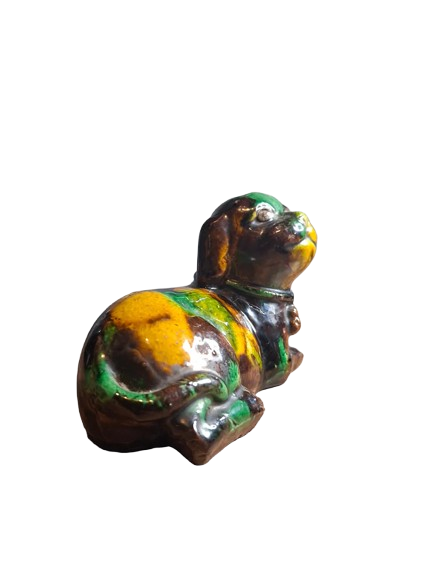 Chinese 'egg and spinach'-glazed biscuit porcelain figure of a Dog Kangxi