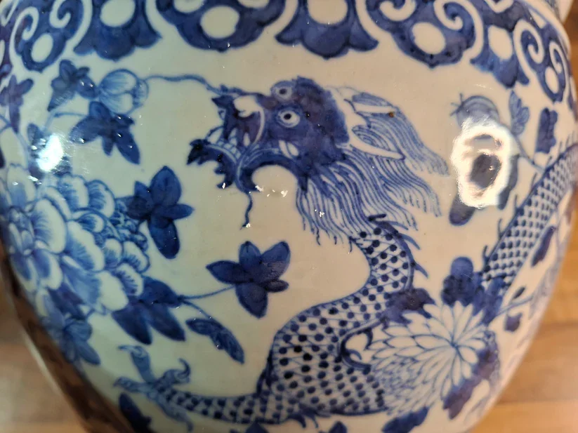 Detailed painting of a dragon on a A Fine Blue and White Dragon Planter, China, Qing Dynasty, 18th/19th Century