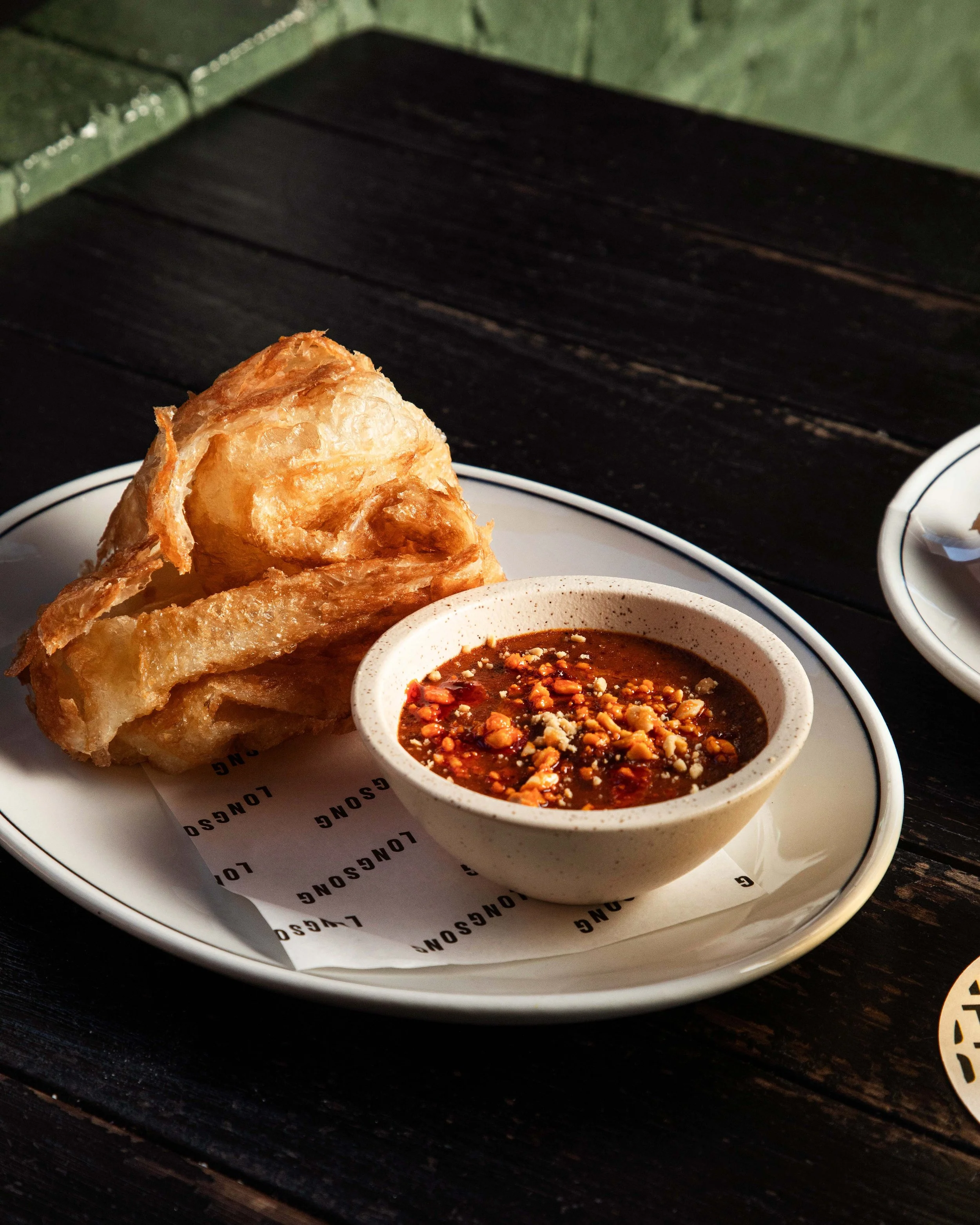 Flaky roti canai bar snack at Longsong.