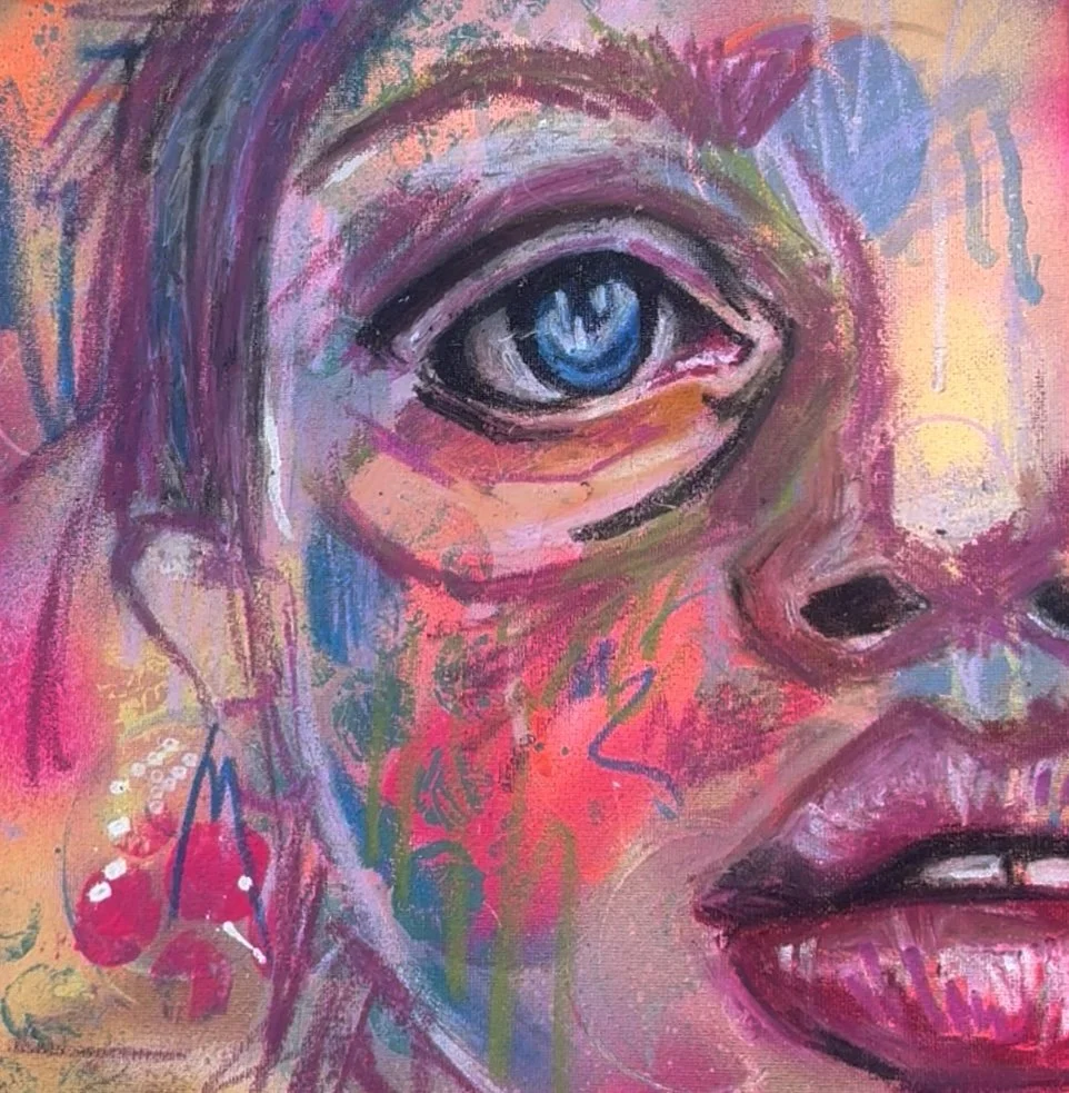 Colorful abstract painting of a woman's face, focusing on a blue eye, pink lips, and a cherry earring, with vibrant brushstrokes and mixed colors.