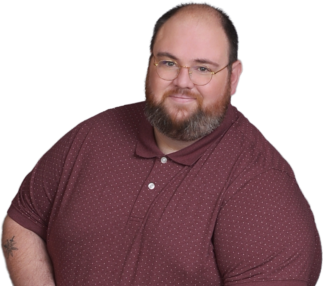 Michael MacDougall, candidate for Nevada Controller, with glasses and a beard, wearing a maroon polo shirt with small white polka dots, looking at the camera and smiling.