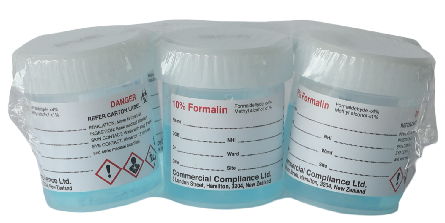 3 rolls of medical or chemical tape labeled with hazard warnings and instructions for handling, sealed in clear plastic.