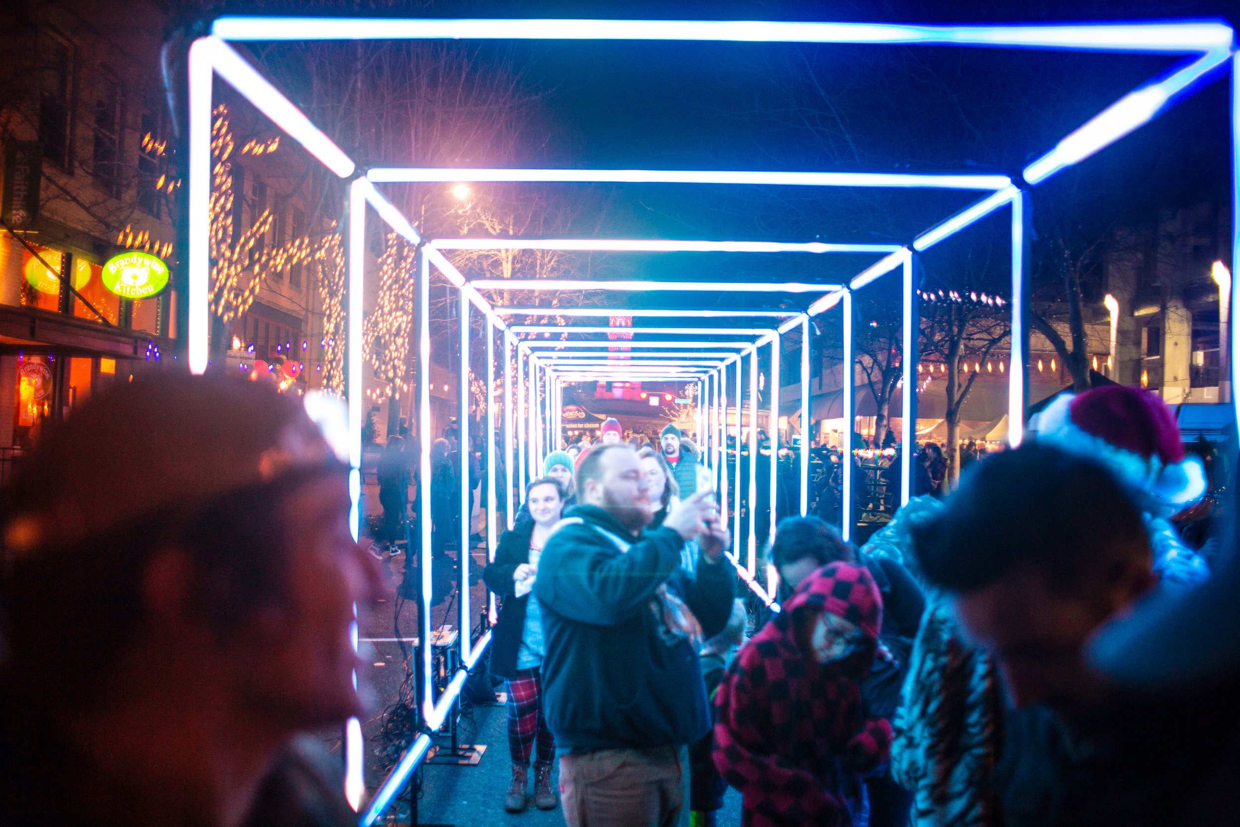 bellingham-commercial-stree-night-market-winter-solstice-tubix-led-tunnel-downtown-partnership-washington-event-lighting-nova-light-labs-hero-1.jpg