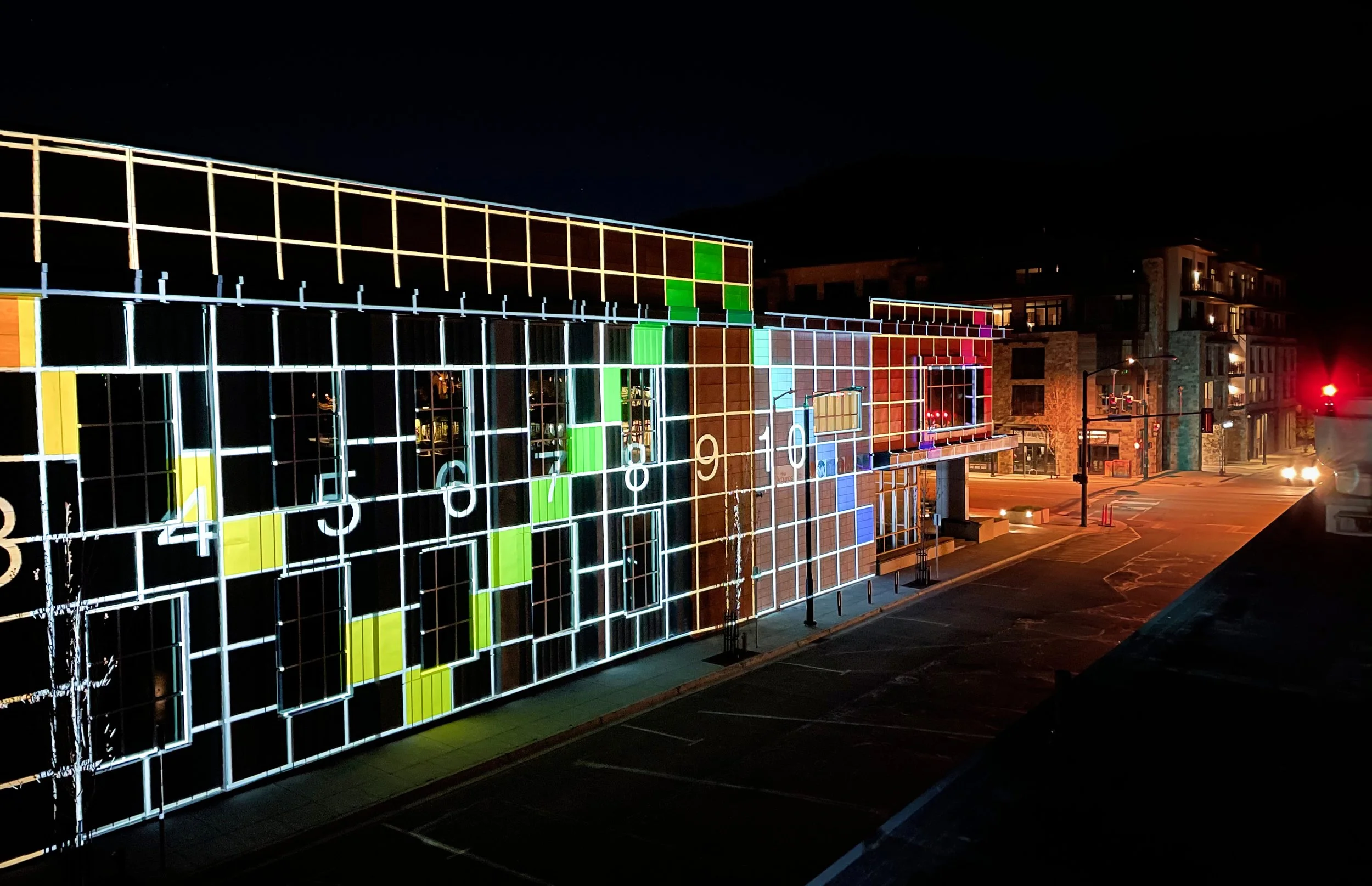 The Argyros projection mapping in Ketchum, Idaho, calibration grid aligned across the full facade