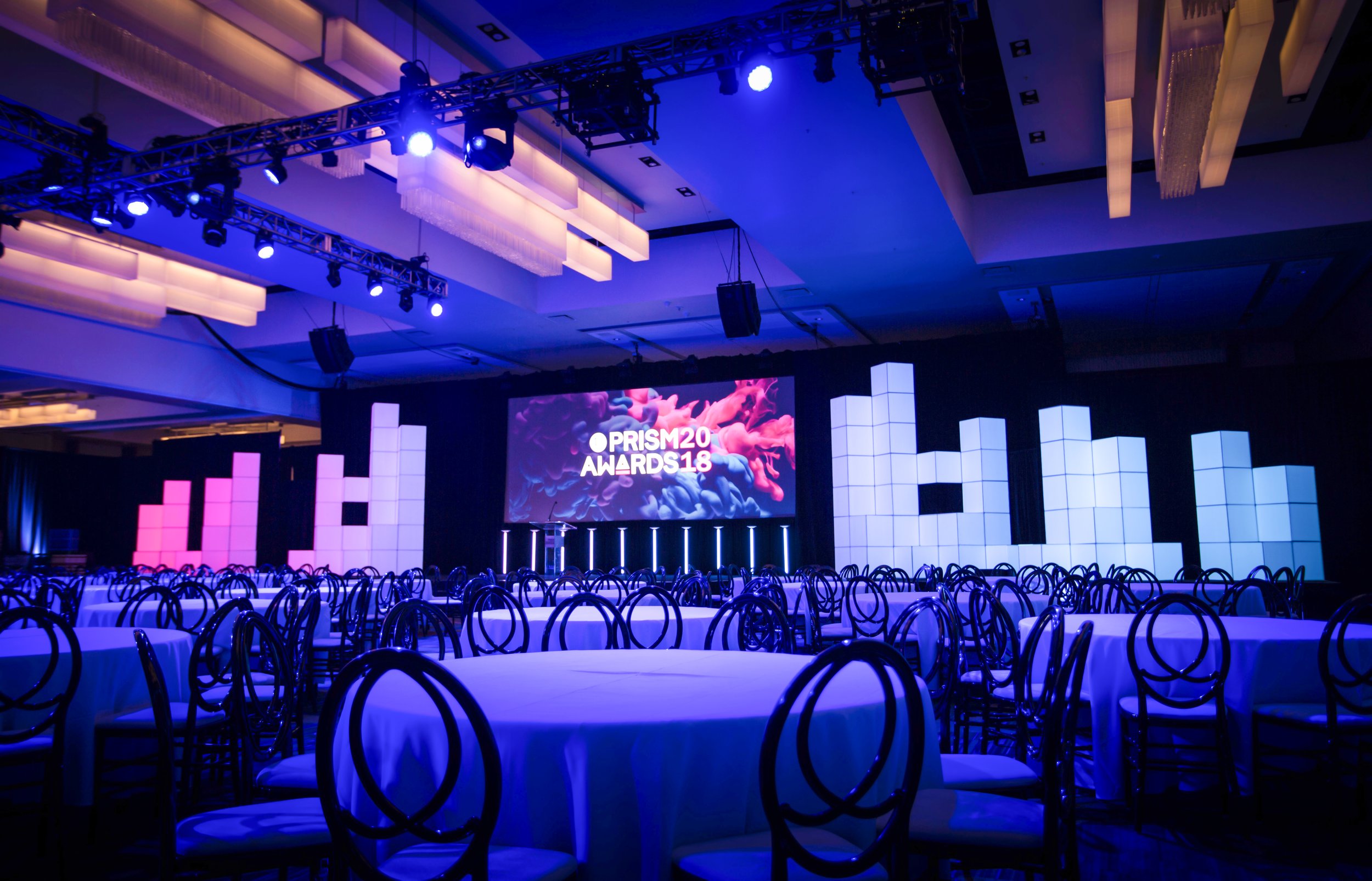 SPIE PRISM Awards projection mapping stage at Photonics West, empty ballroom set before doors open