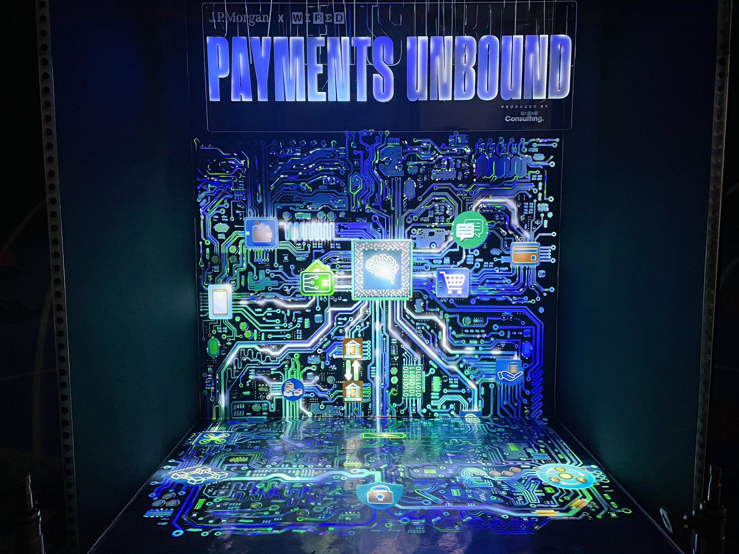 J.P. Morgan Payments Unbound projection mapping booth at Money20/20, circuit board walls and floor
