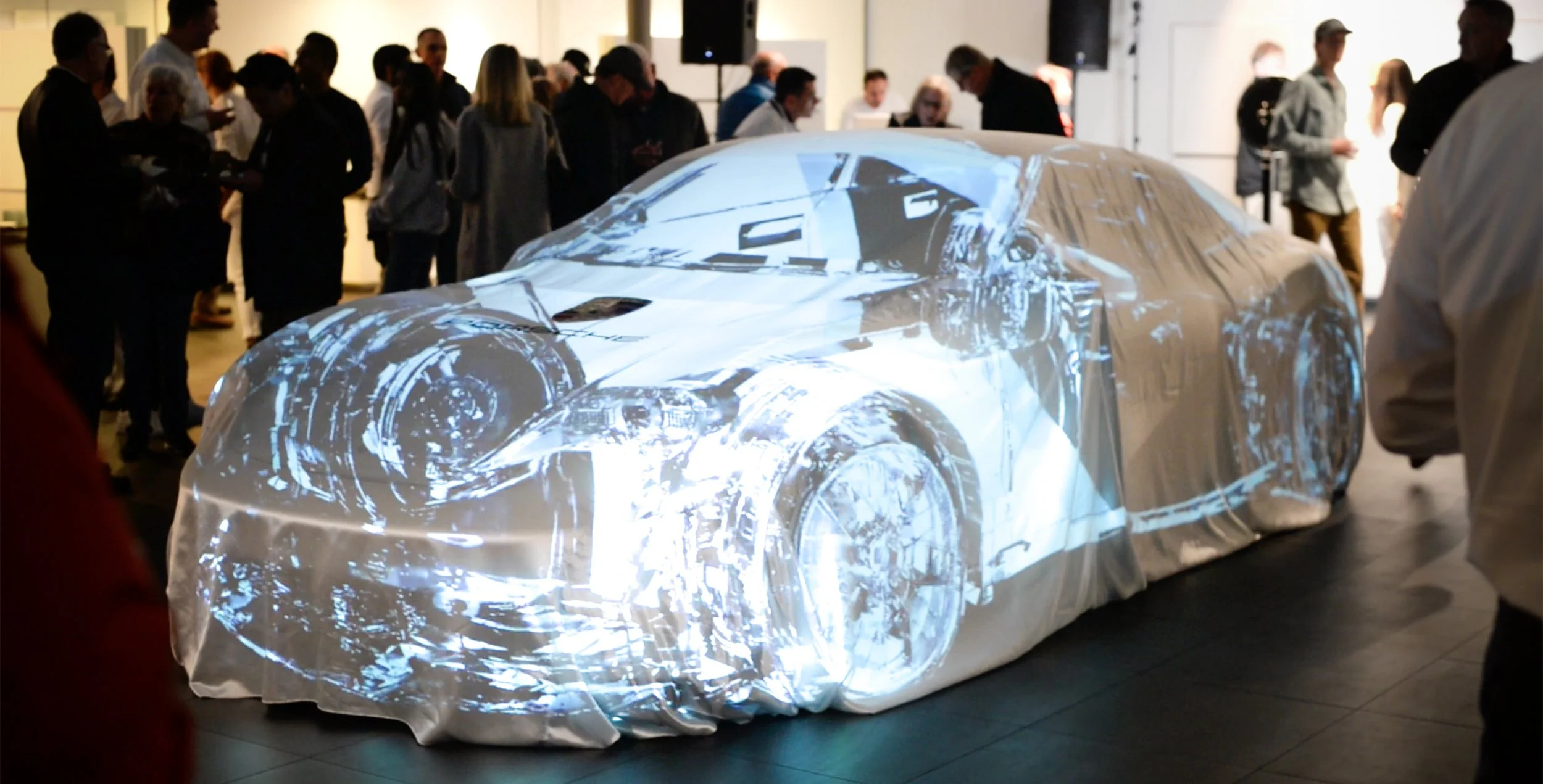 Lumenarius 3D Projection Mapping System Event Video Lighting Porsche Taycan Unveil Bellingham Washington