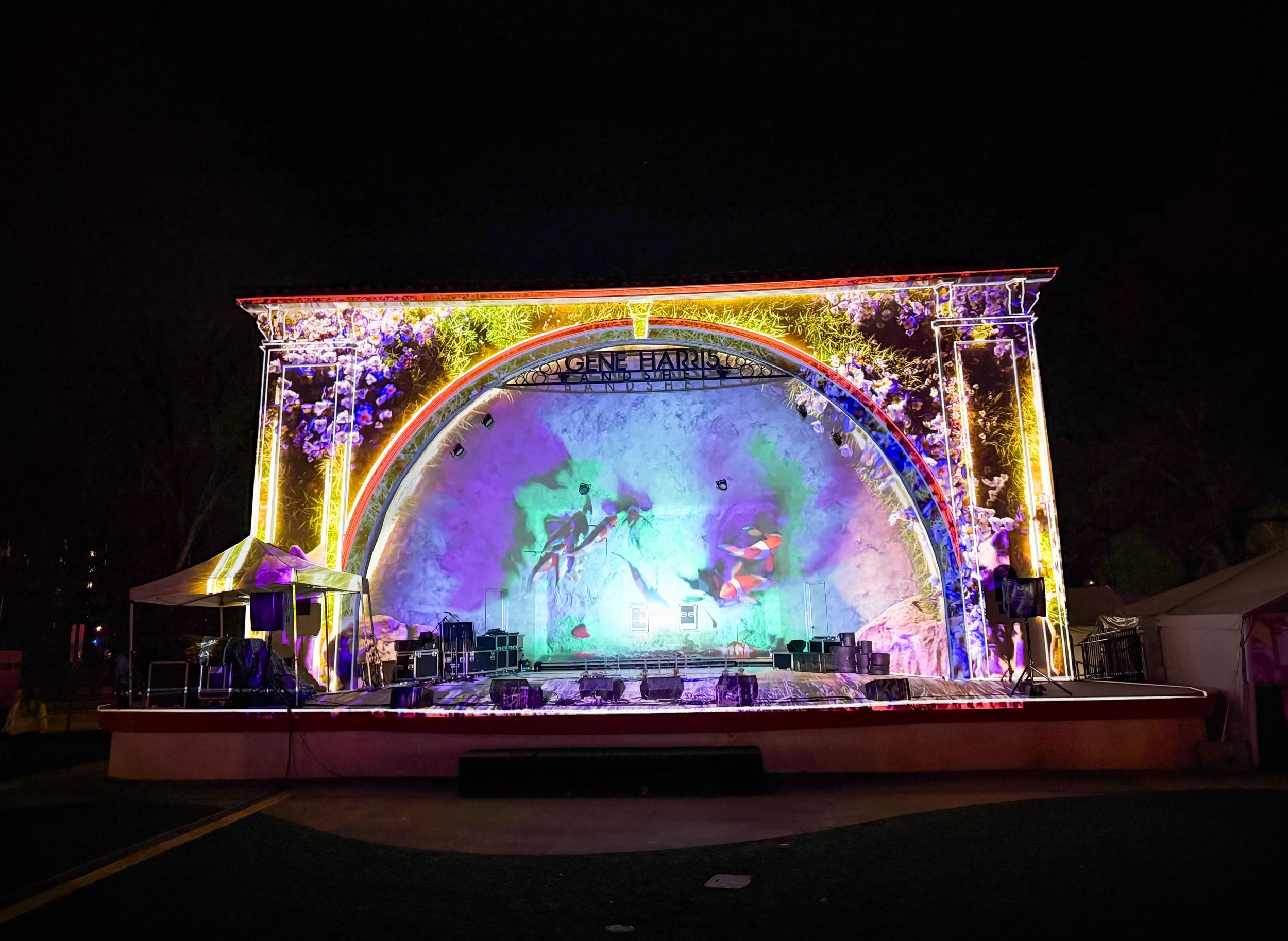 Projection mapping on the Treefort Music Fest Gene Harris Bandshell in Boise, wide night shot of an aquatic scene.