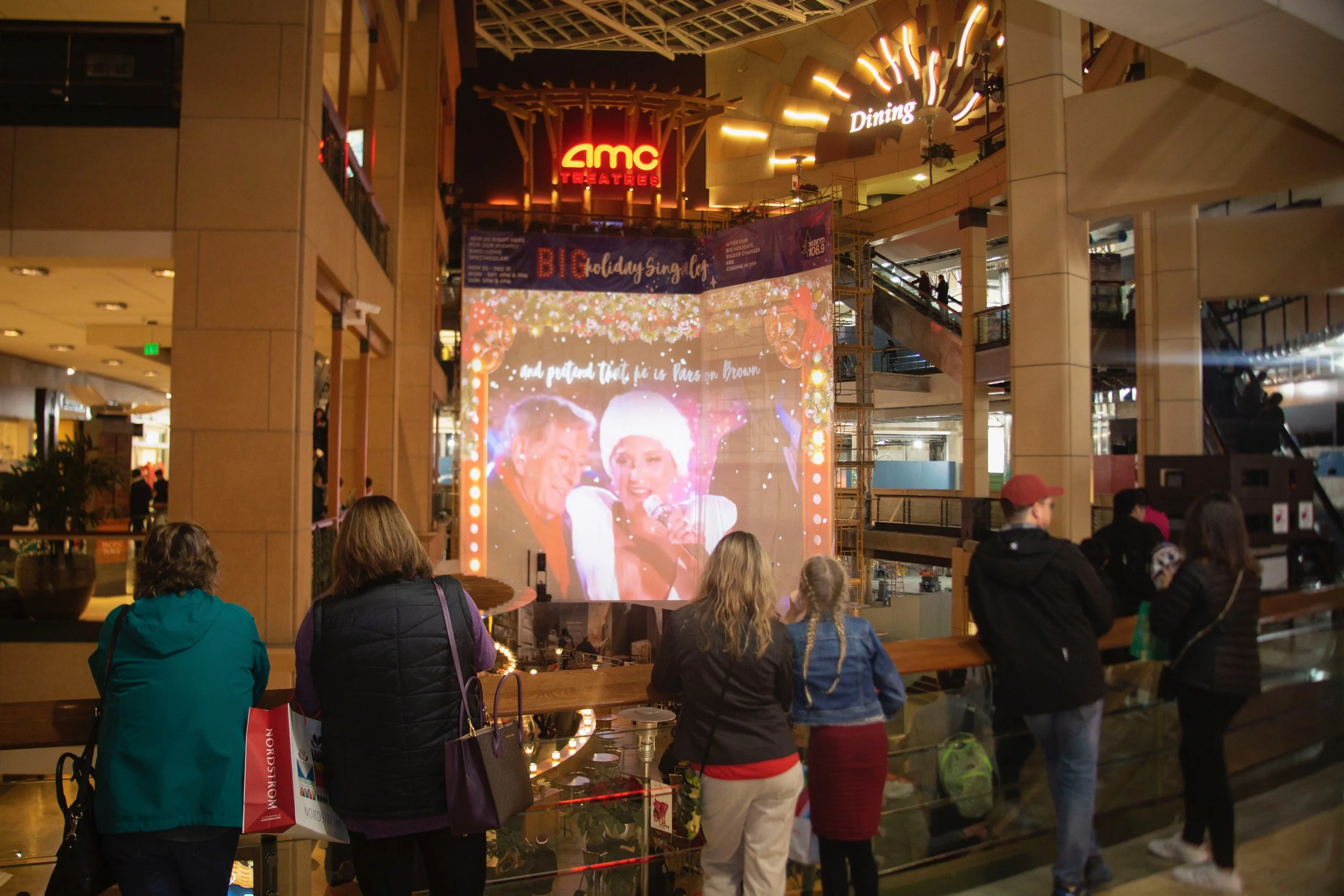 pacific-place-shopping-center-projection-mapping-holiday-show-architecture-custom-visuals-sing-a-long-seattle-washington-nova-light-labs-hero-1.jpg