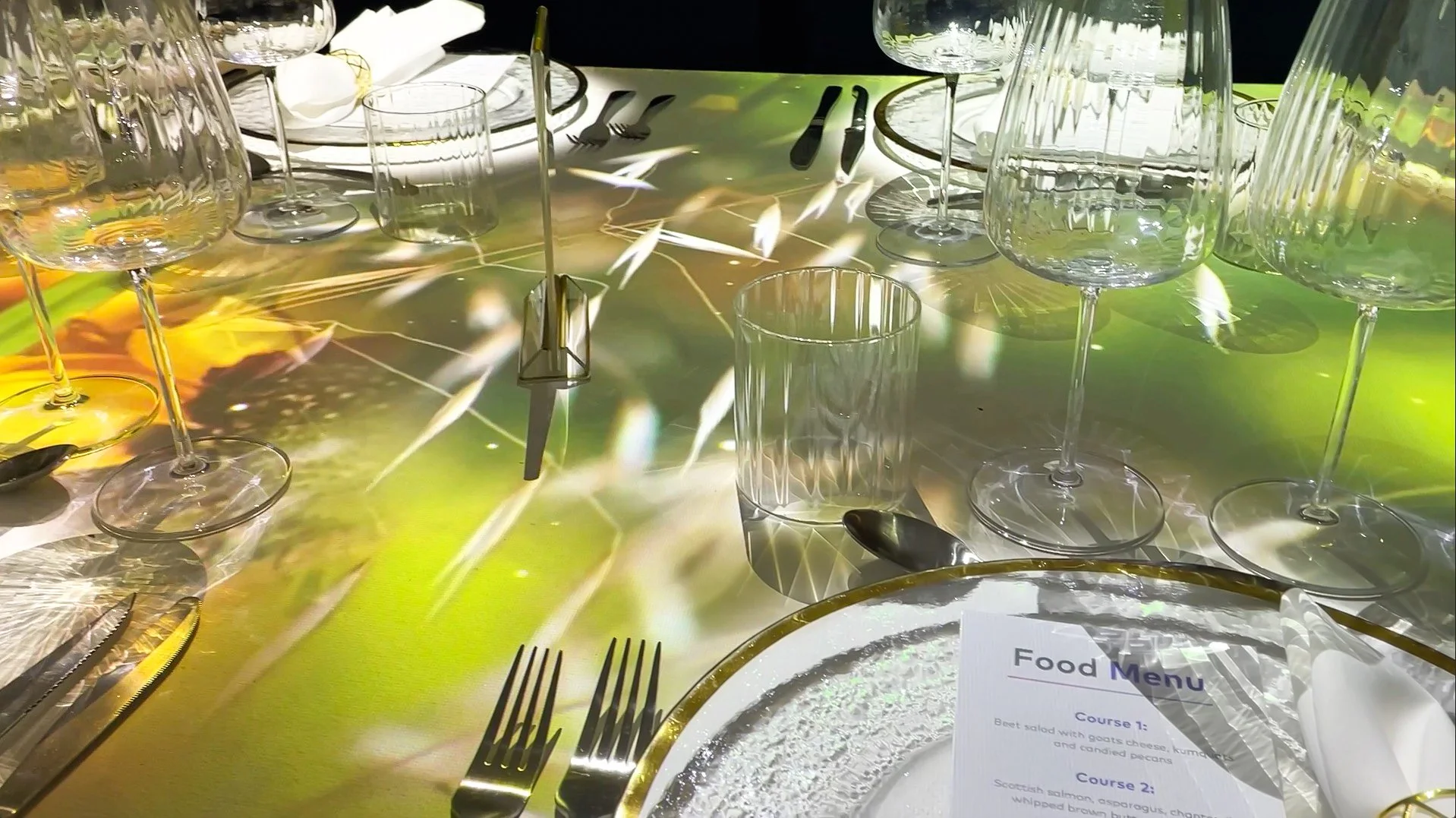 Galleri immersive dining projection mapping at Knife House Palm Springs, greenery and wildflower light across crystal