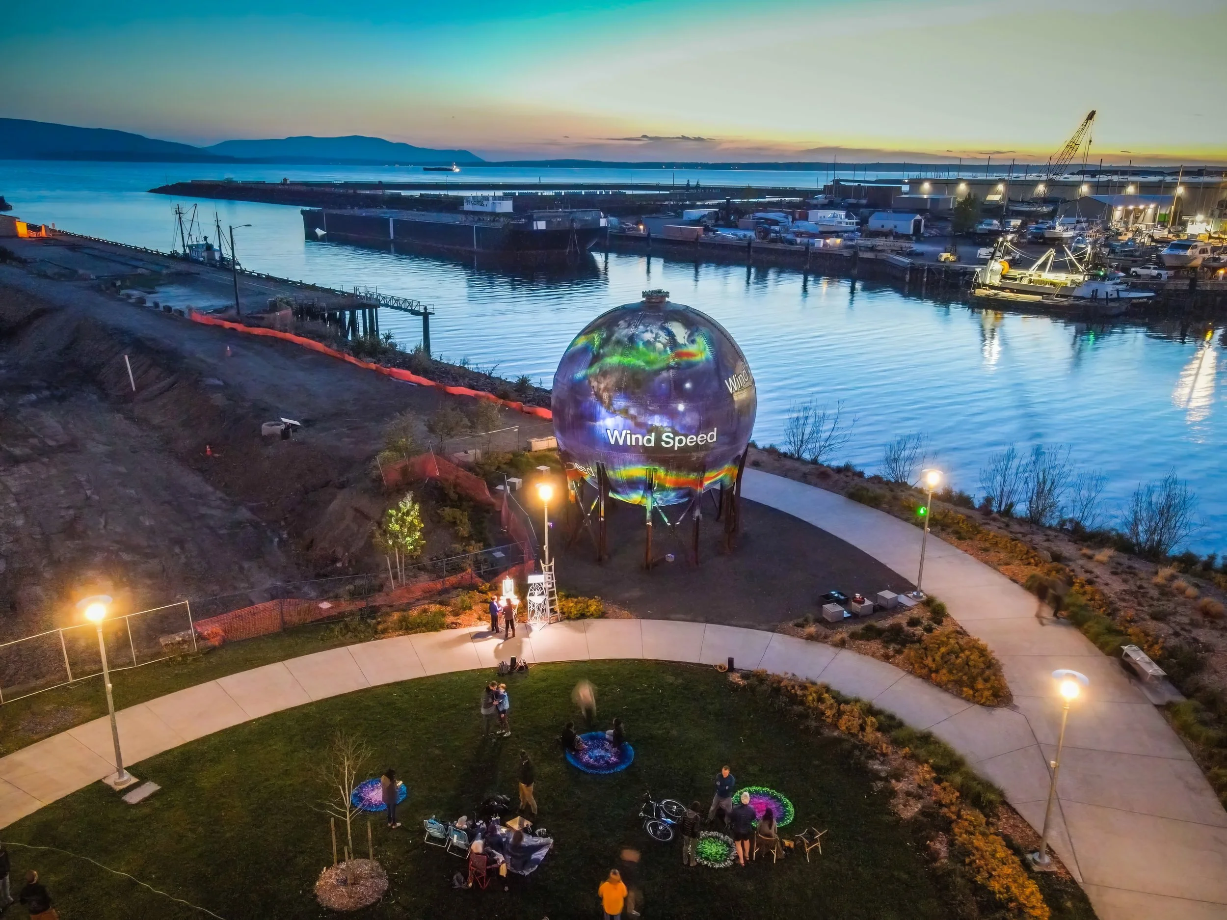 Bellingham Acid Ball projection mapping at Waypoint Park, aerial view of the lit sphere over the harbor