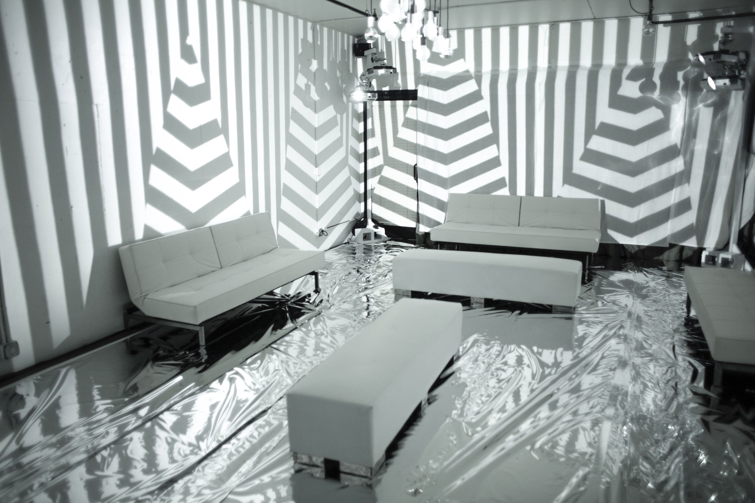 Fremont Foundry immersive room, black and white chevron mapping wrapping every wall of the lounge
