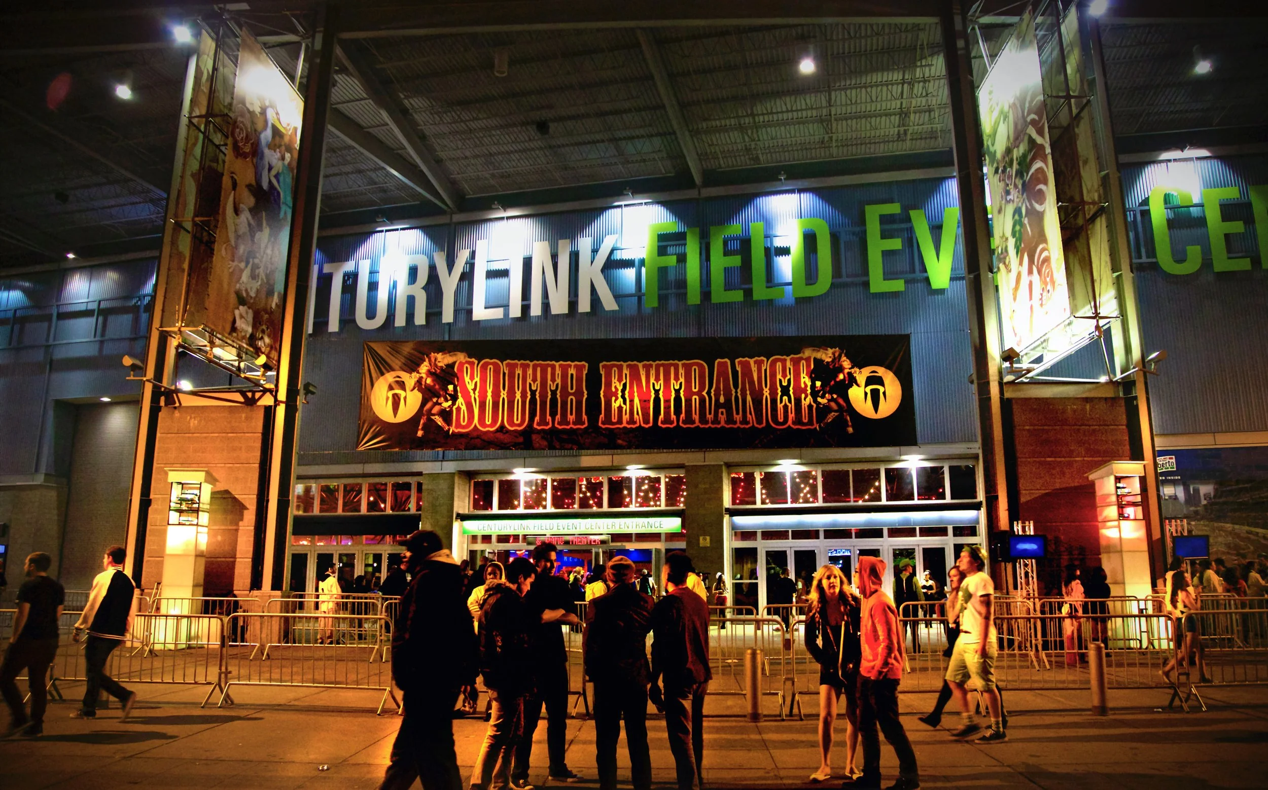Freaknight Music Festival in downtown Seattle, crowd gathered at the lit CenturyLink Field south entrance