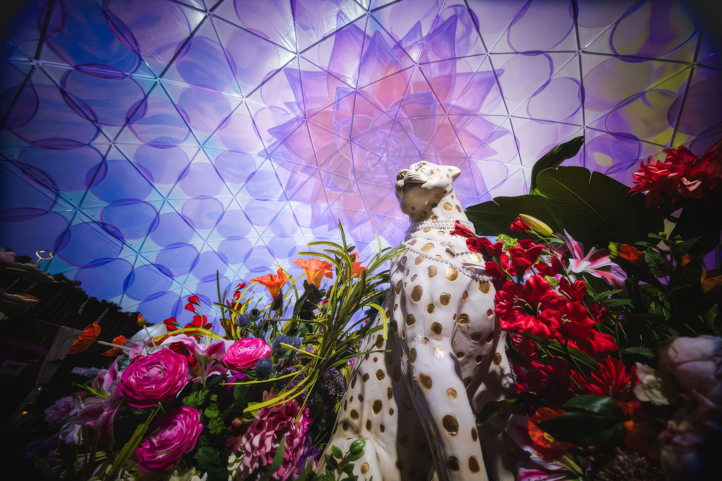 Villa Fleur dome projection at Desert Ridge Marketplace, leopard statue below a kaleidoscopic mapped ceiling