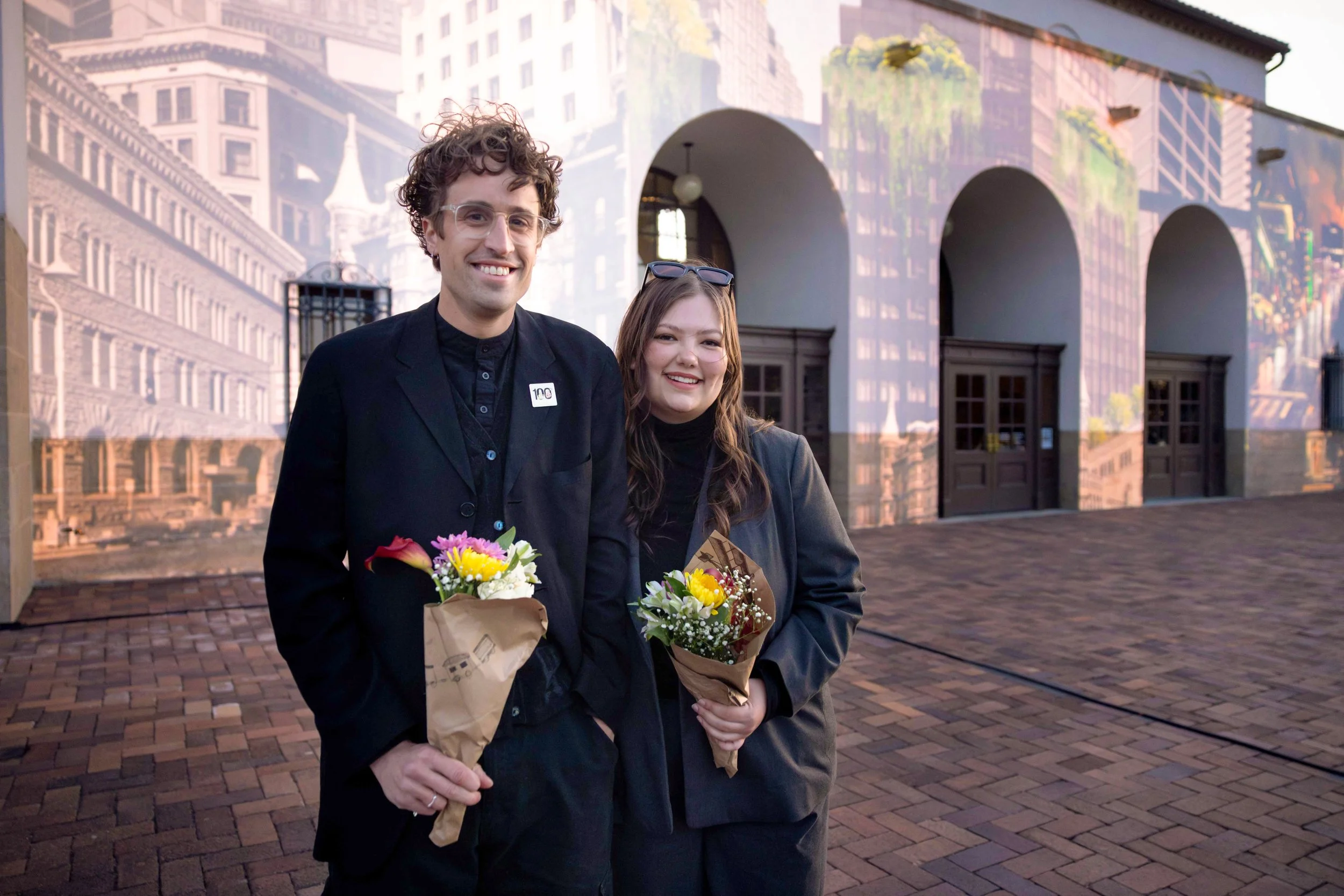 Boise Depot 100th anniversary, artists Will Miller and Annika Kalac before their projected artwork