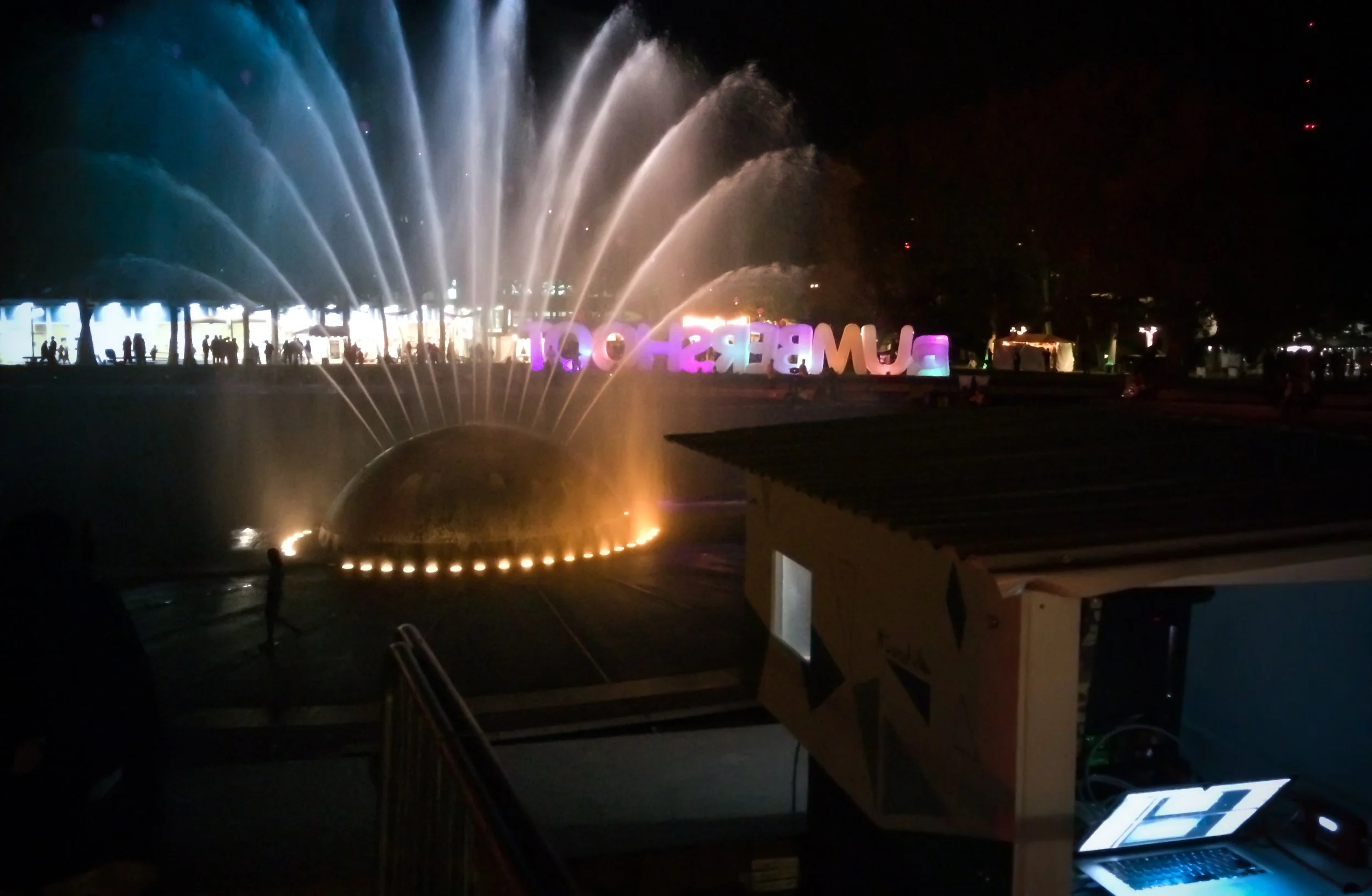 Bumbershoot International Fountain projection system, illuminated festival letters behind the water arcs