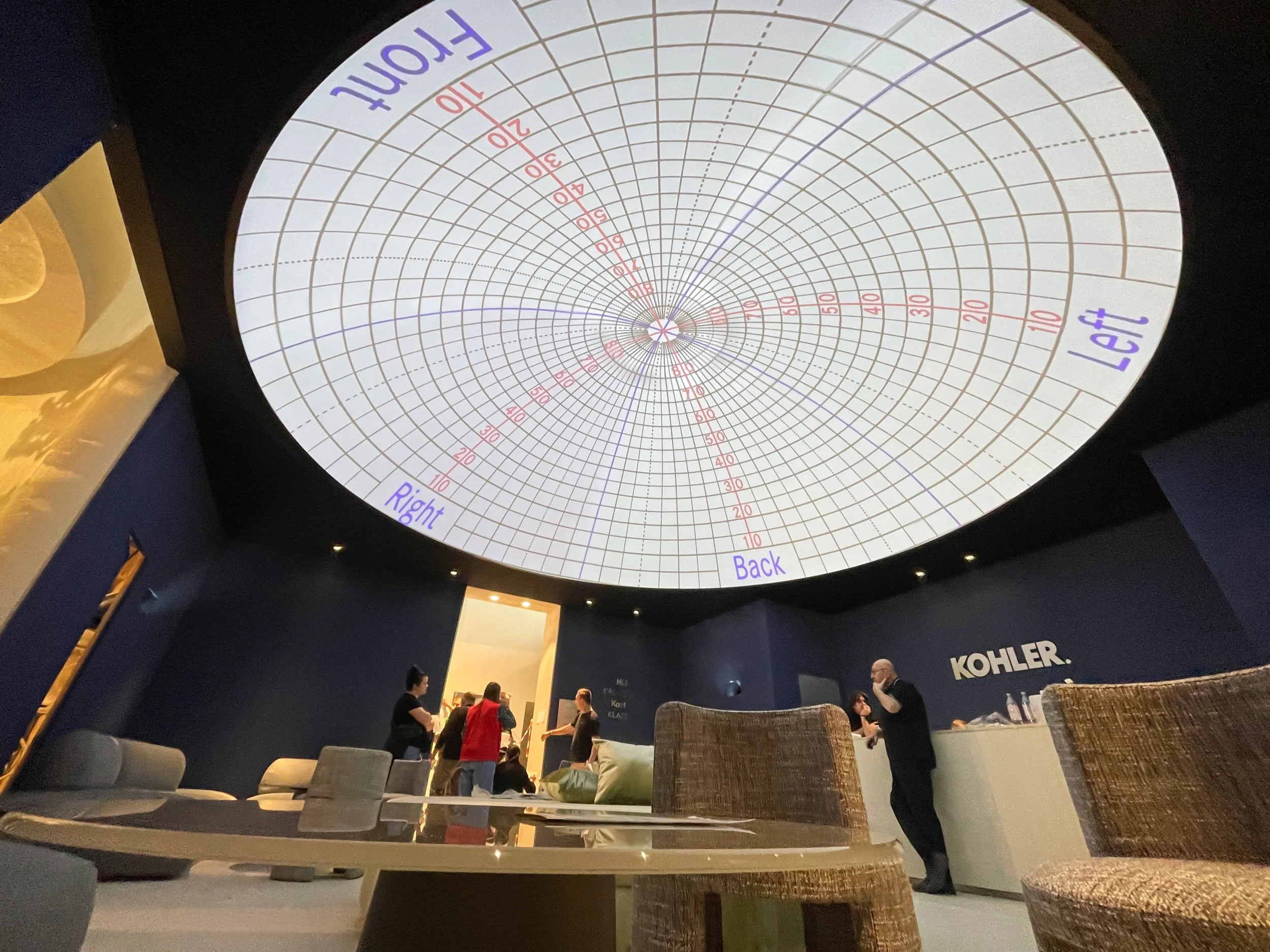 Kohler dome projection system at Salone del Mobile, calibration grid mapped across the full ceiling