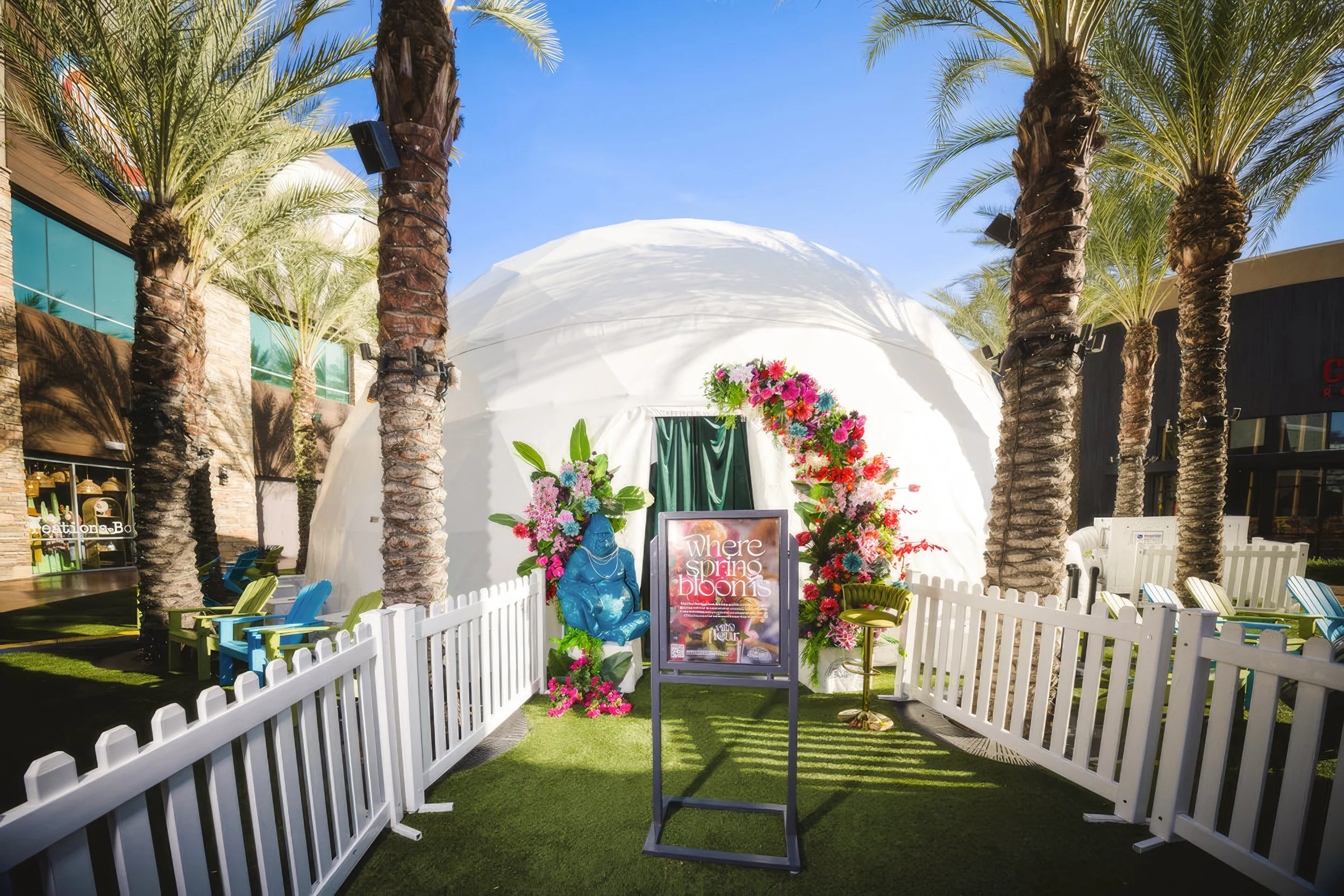 Villa Fleur geodesic dome at Desert Ridge Marketplace, floral entrance arch and spring blooms signage