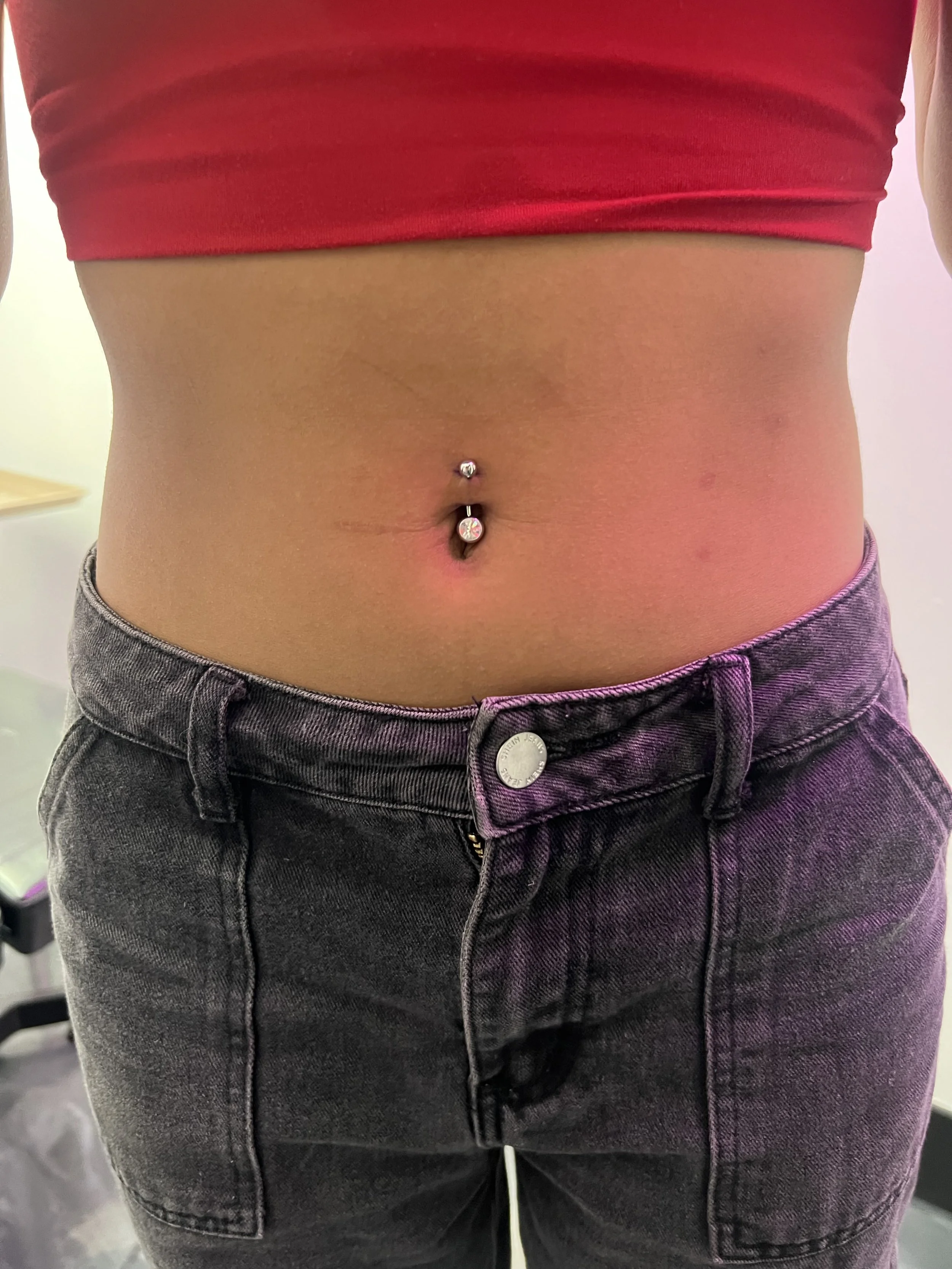Imperio Ink Navel Piercing