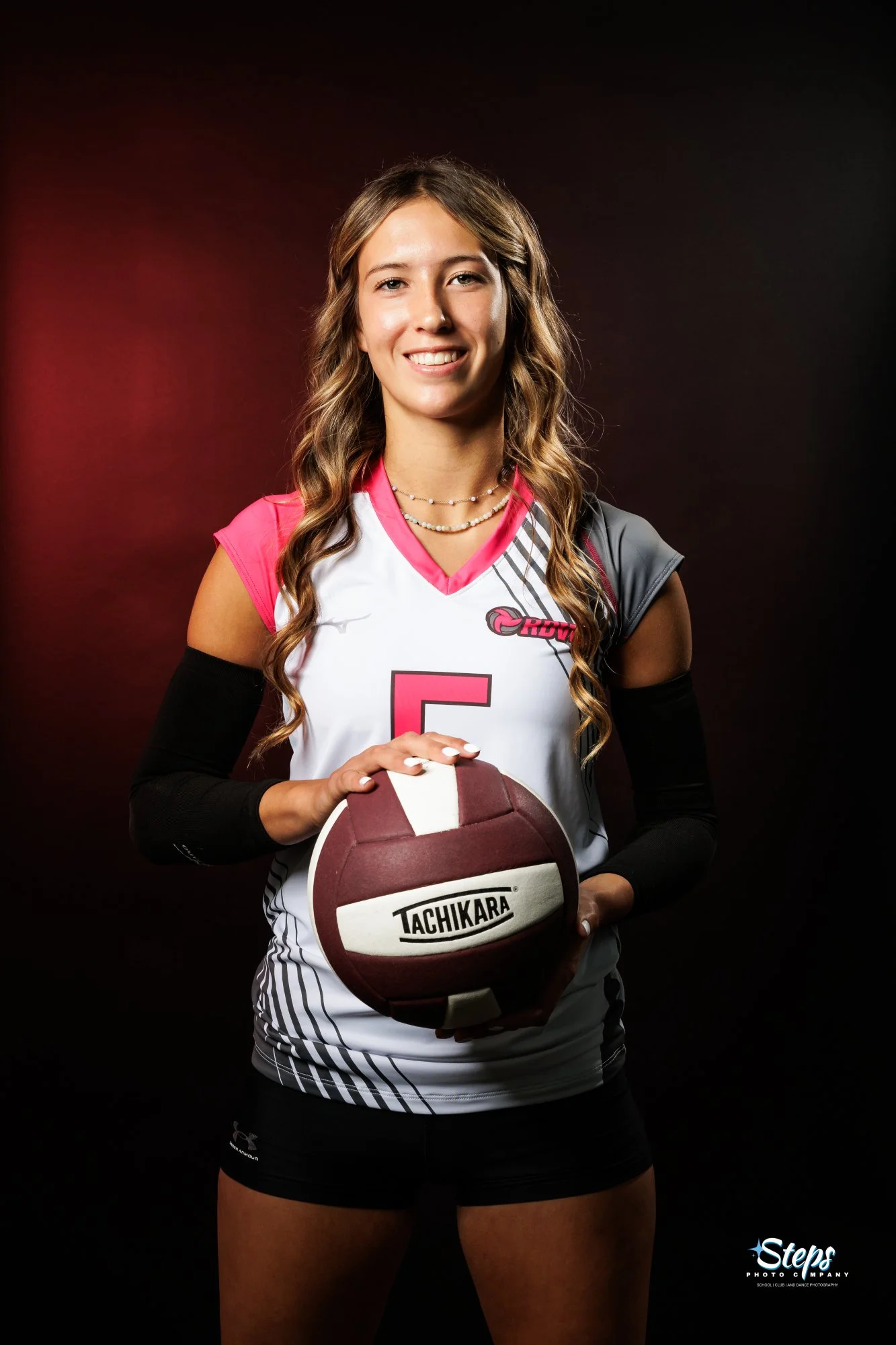 volleyball photo black background with background gel colored light