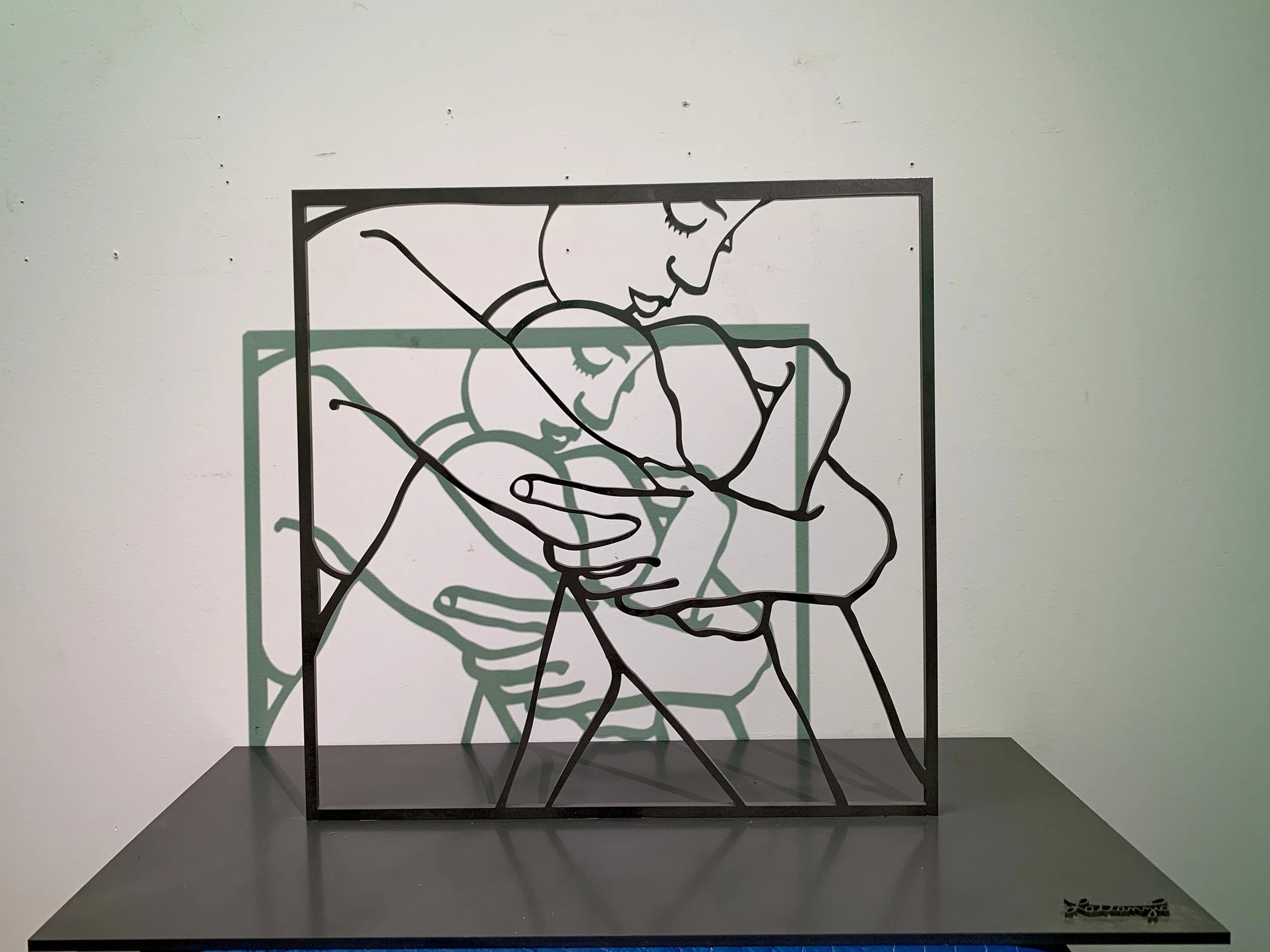 Look Inside
carved metal on metal base, paint
24 x24 x 3/8 inch on 36 x 18 x1/2 inch base