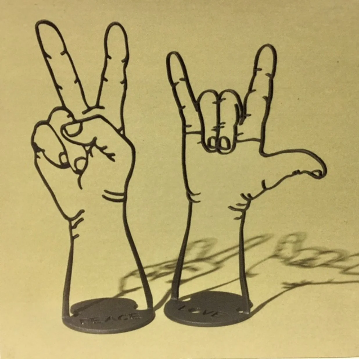 Peace and Love Hands
carved steel, paint
7 inches x 12 inches on 4 inch diameter base (carved from one plate 3/16 steel)
