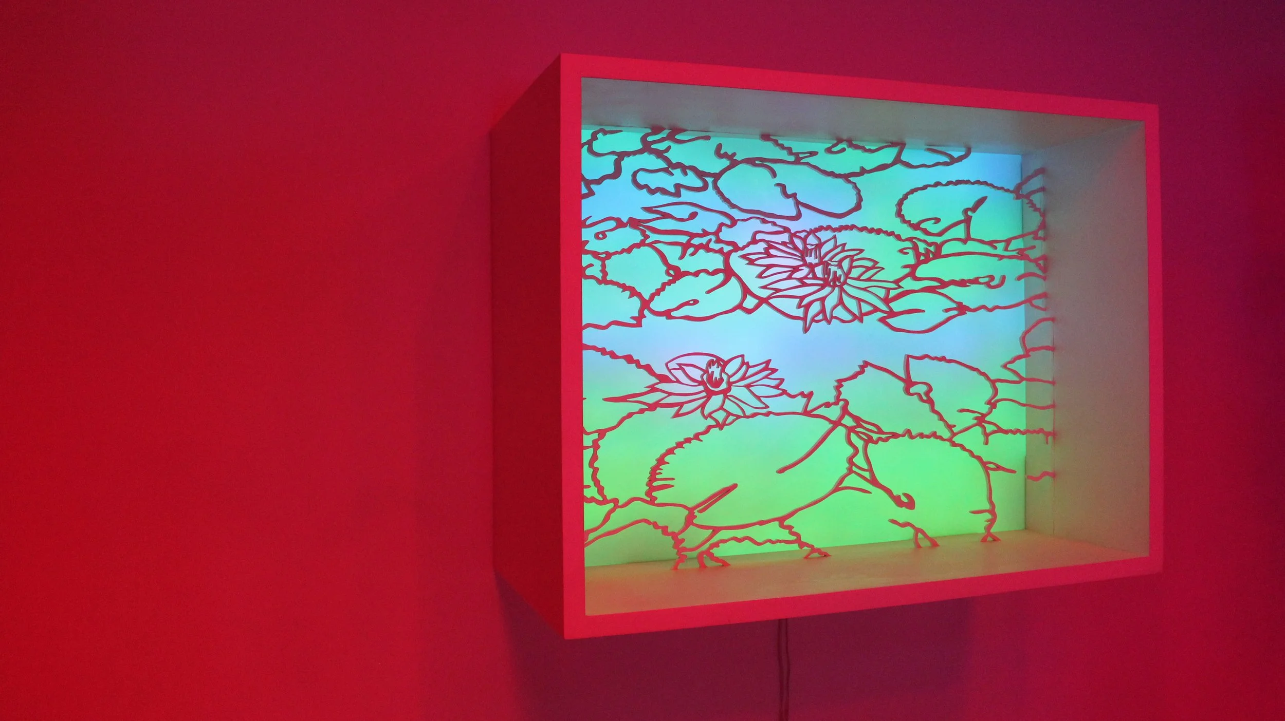 Waterlilies
carved wood, acrylic filter/backing, led light
48 x 36 x 12 inches