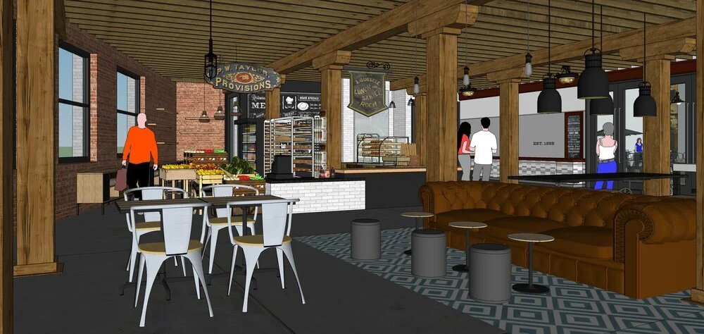 Interior of a modern cafe or restaurant with seating, tables, and a food counter, featuring brick and wood decor and large windows.