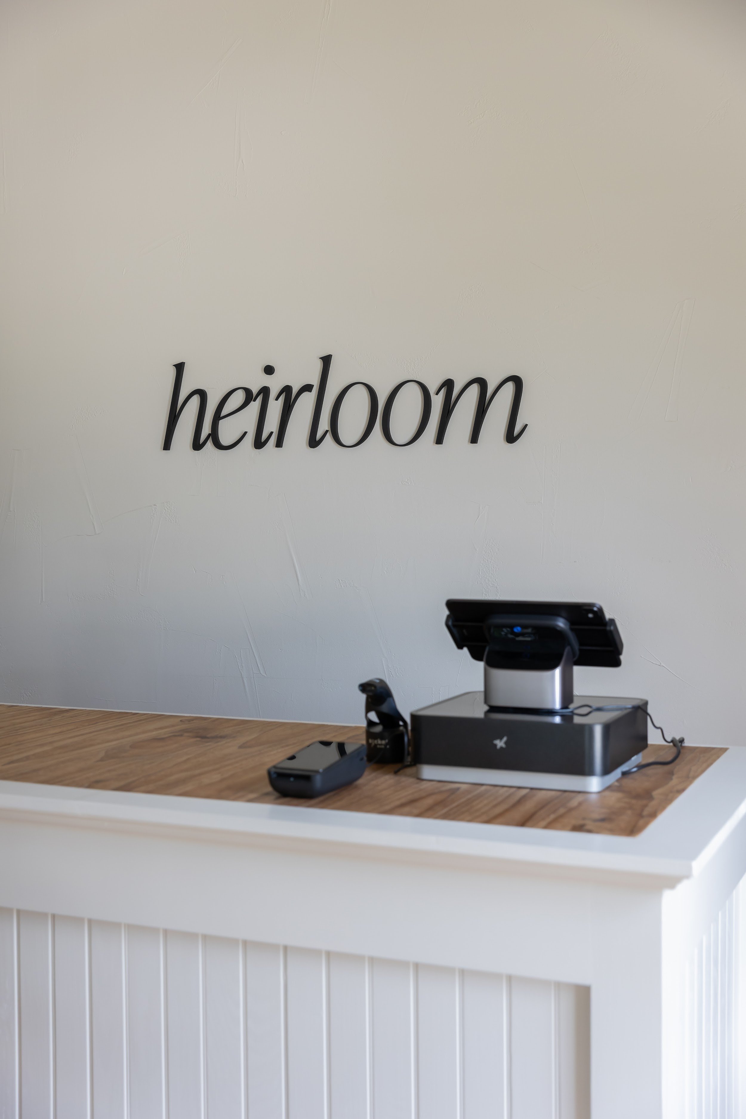 heirloom-avenue-n-heirloom-logo-wall-marble-falls-tx.jpg