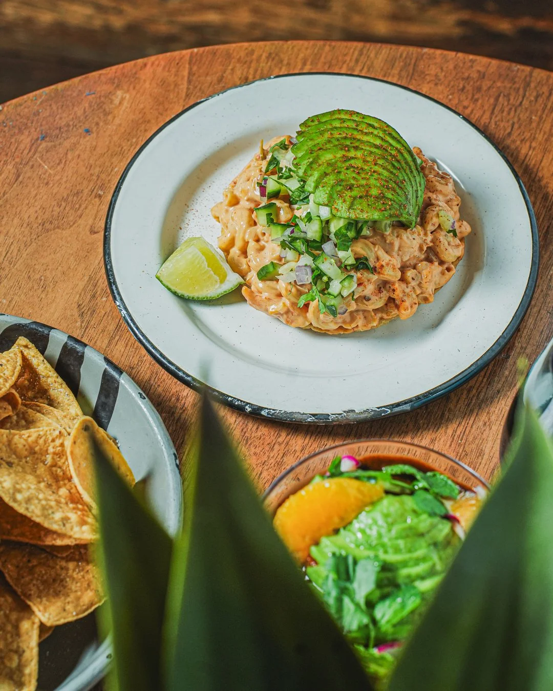 SHE'S BAAAAACCCKKK : Shrimp y Mac Tostada 

Inspired by the street tostadas our team enjoyed while visiting Ensenada, Mexico 🇲🇽 This tostada combines macaroni, perfectly poached shrimp, ancho a&iuml;oli , avocado and secret spices&hellip; come try 