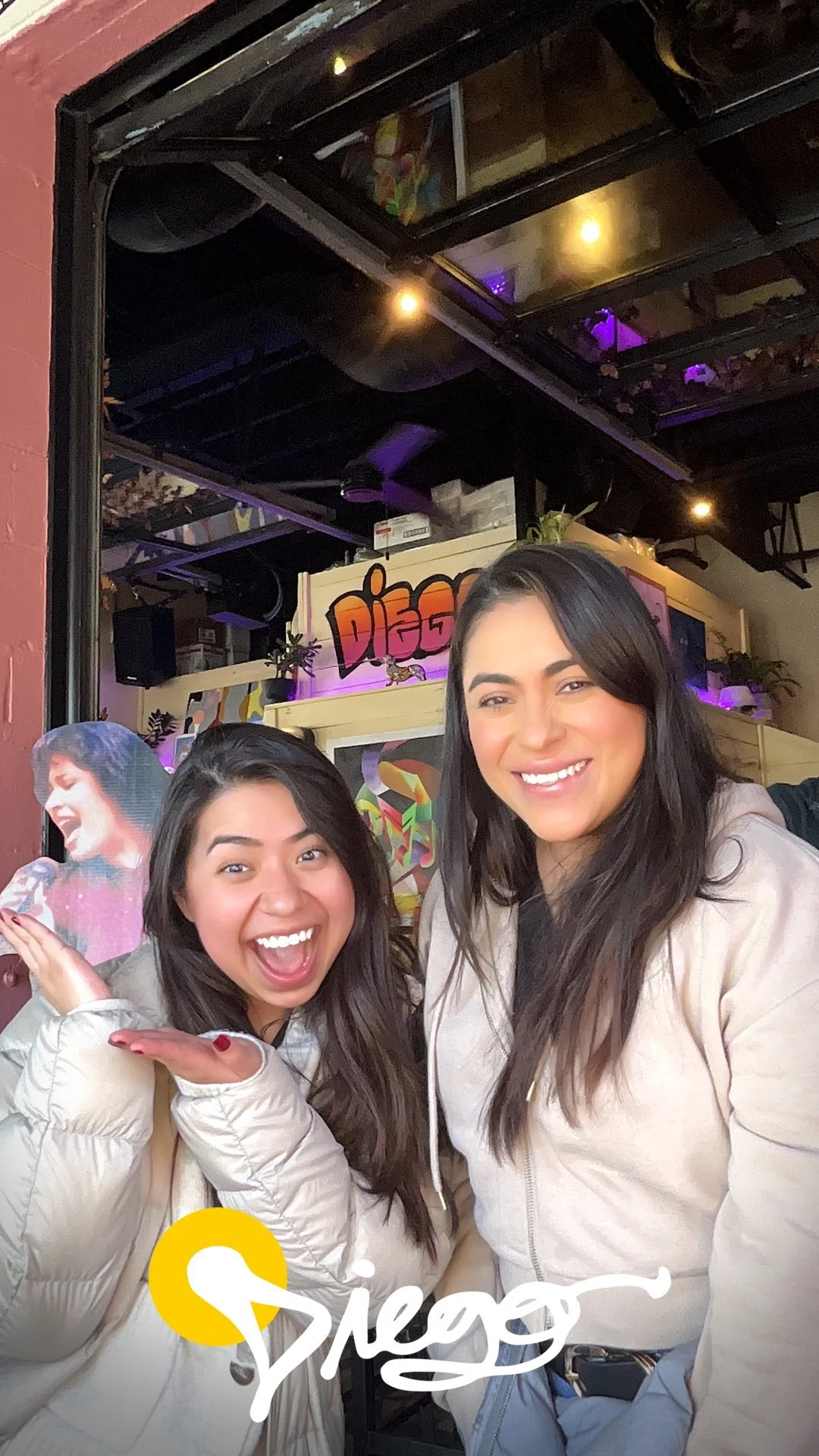 Friends by the Diego sign
