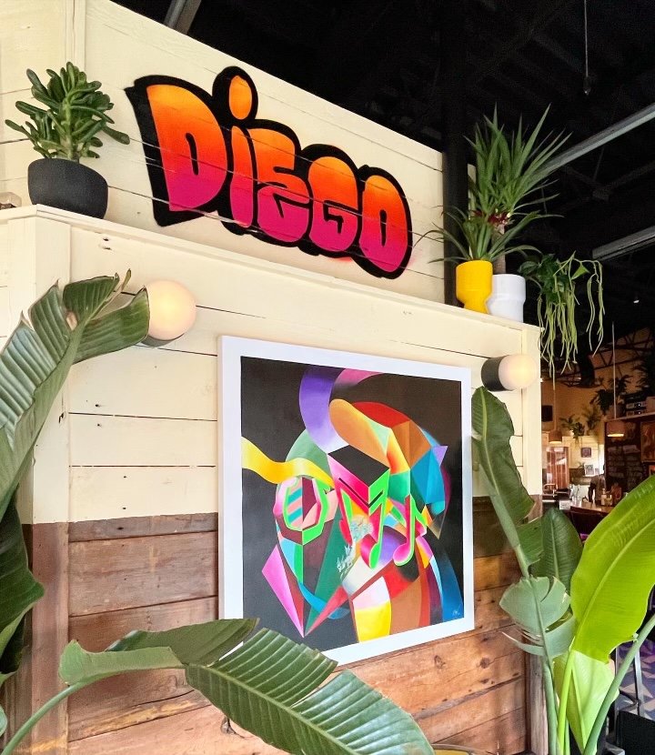 Diego interior with sign and art