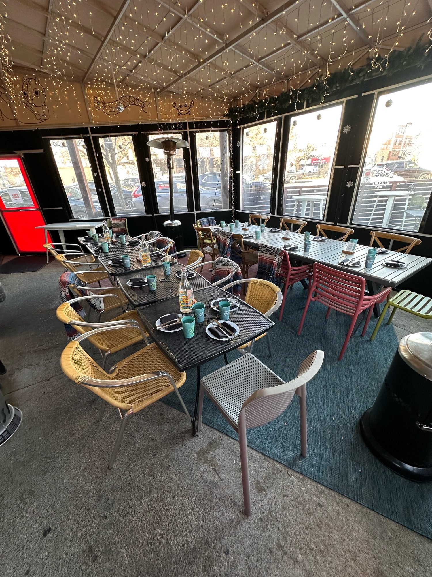 Covered, heated patio with holiday lights