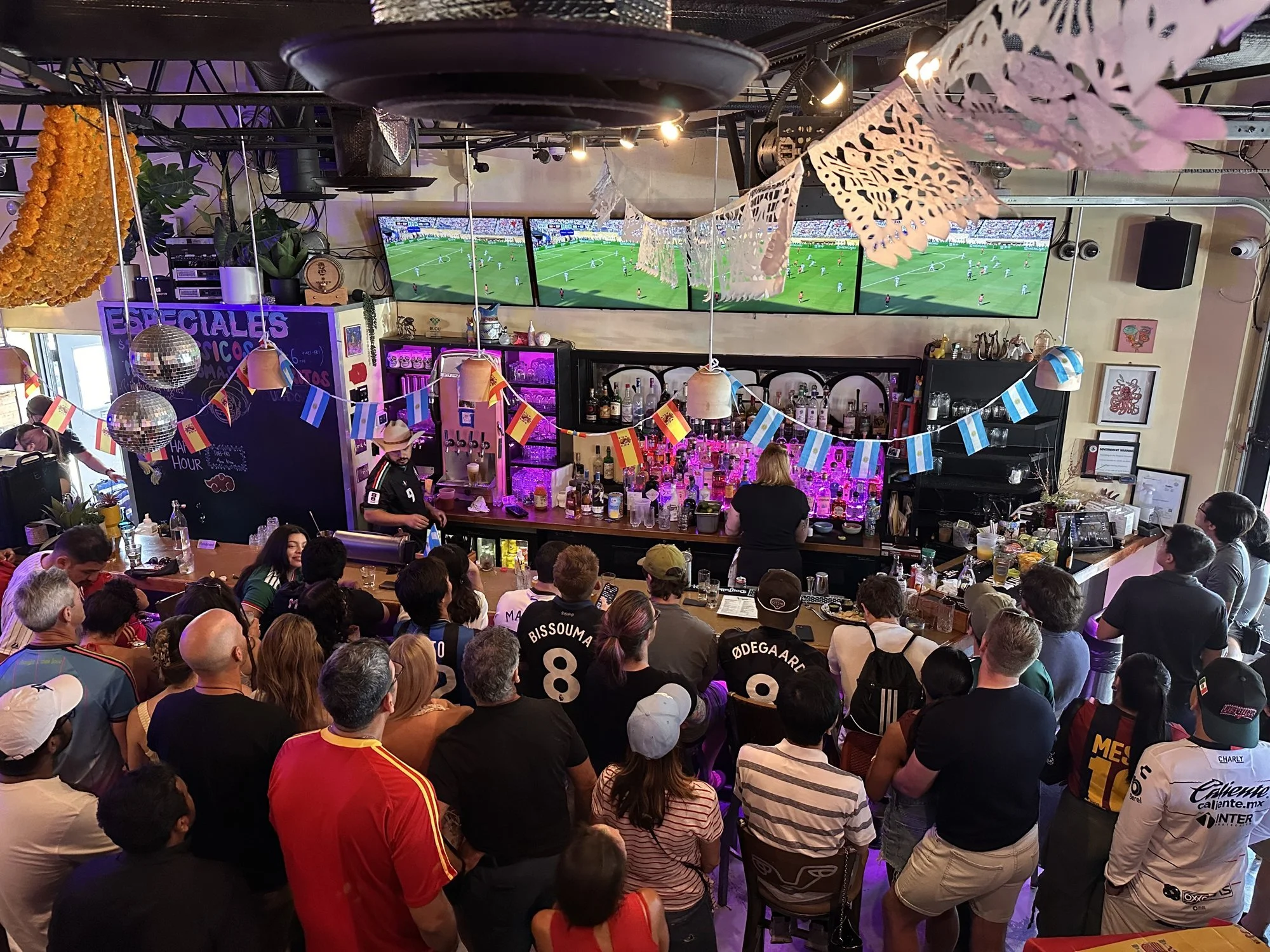 TVs over the bar at Diego streaming sports