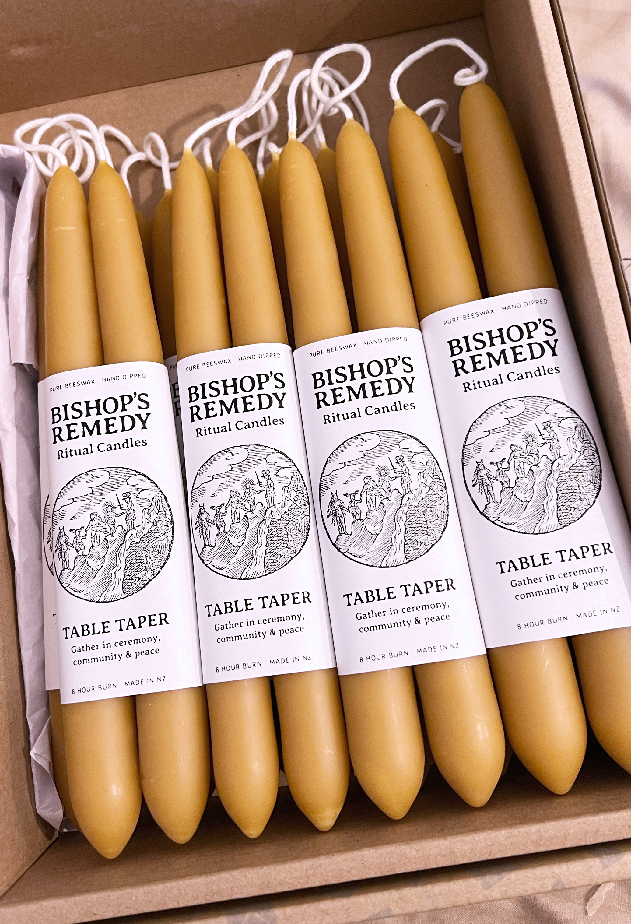 Hand dipped pure beeswax candles by 'Bishop's Remedy Ritual Candles' in golden sunshine yellow, for ritual use. Traditional table tapers, made in New Zealand.