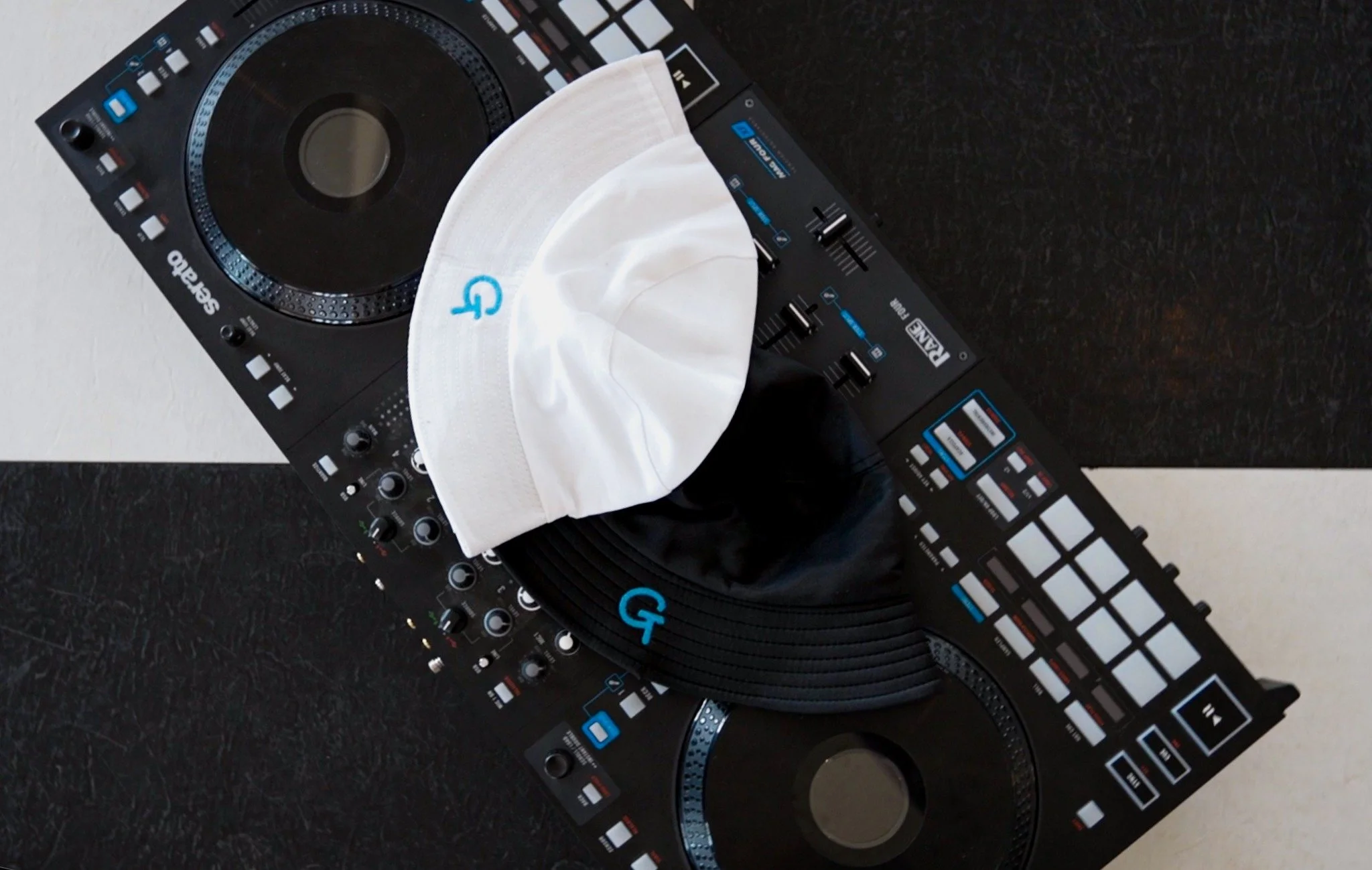 So what&rsquo;s the bucket hat business? Many of you know us as the Bucket Hat DJs. If you&rsquo;ve been to a Good Times wedding, you&rsquo;re familiar with the keepsake we give every couple.

These bucket hats, yes you keep them, are real-time memor