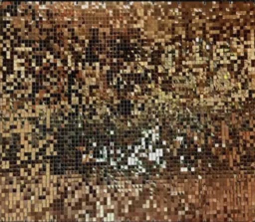 Close-up of a human eye with brown eyelashes and brown iris.