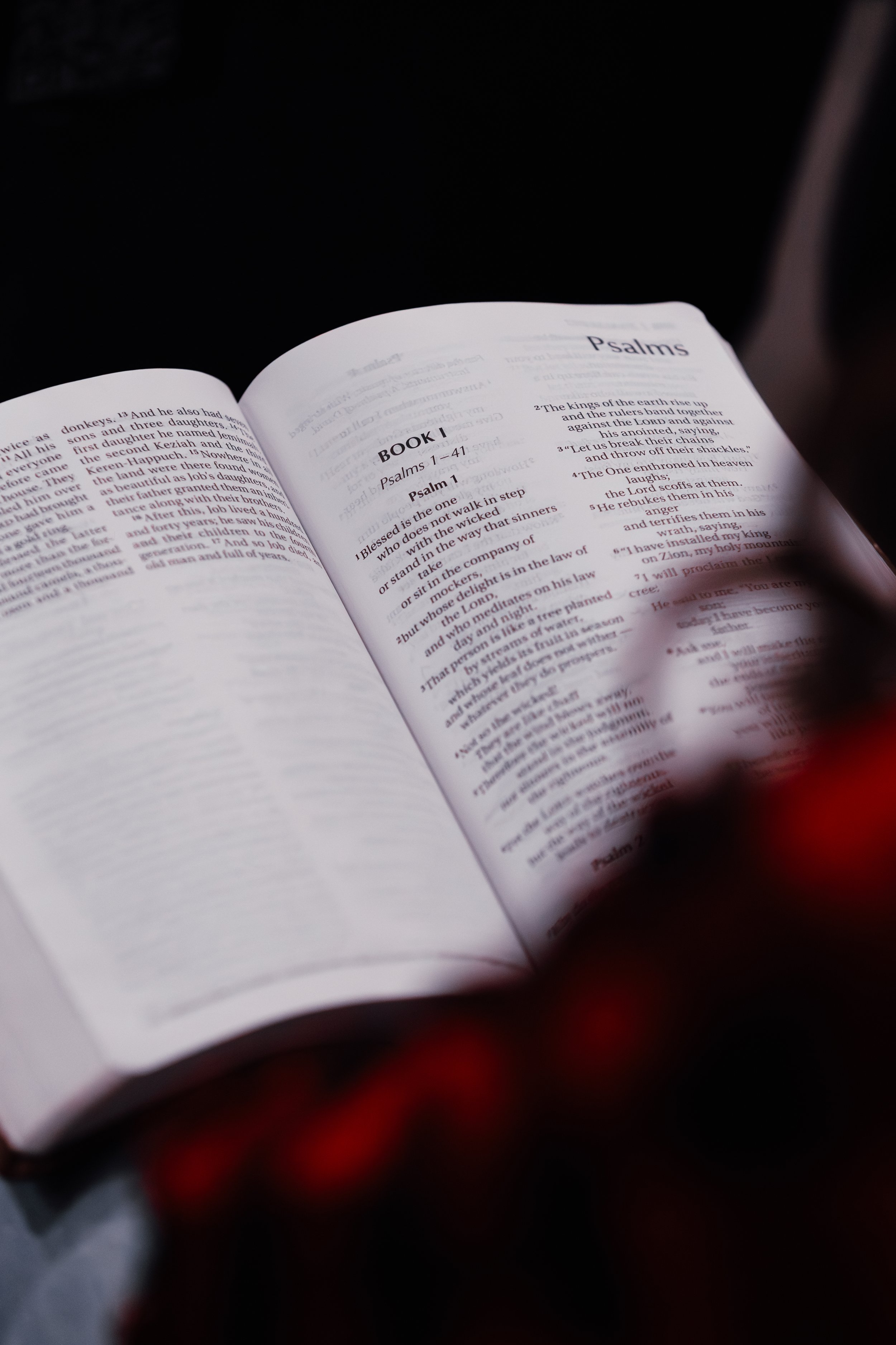 Open Bible with Psalms 1 and Psalms 2 visible on the pages.