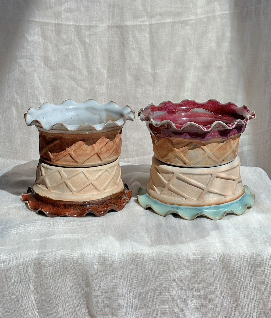 four handmade ceramic waffle cup ice cream bowls in salted caramel and strawberry, side by side.png
