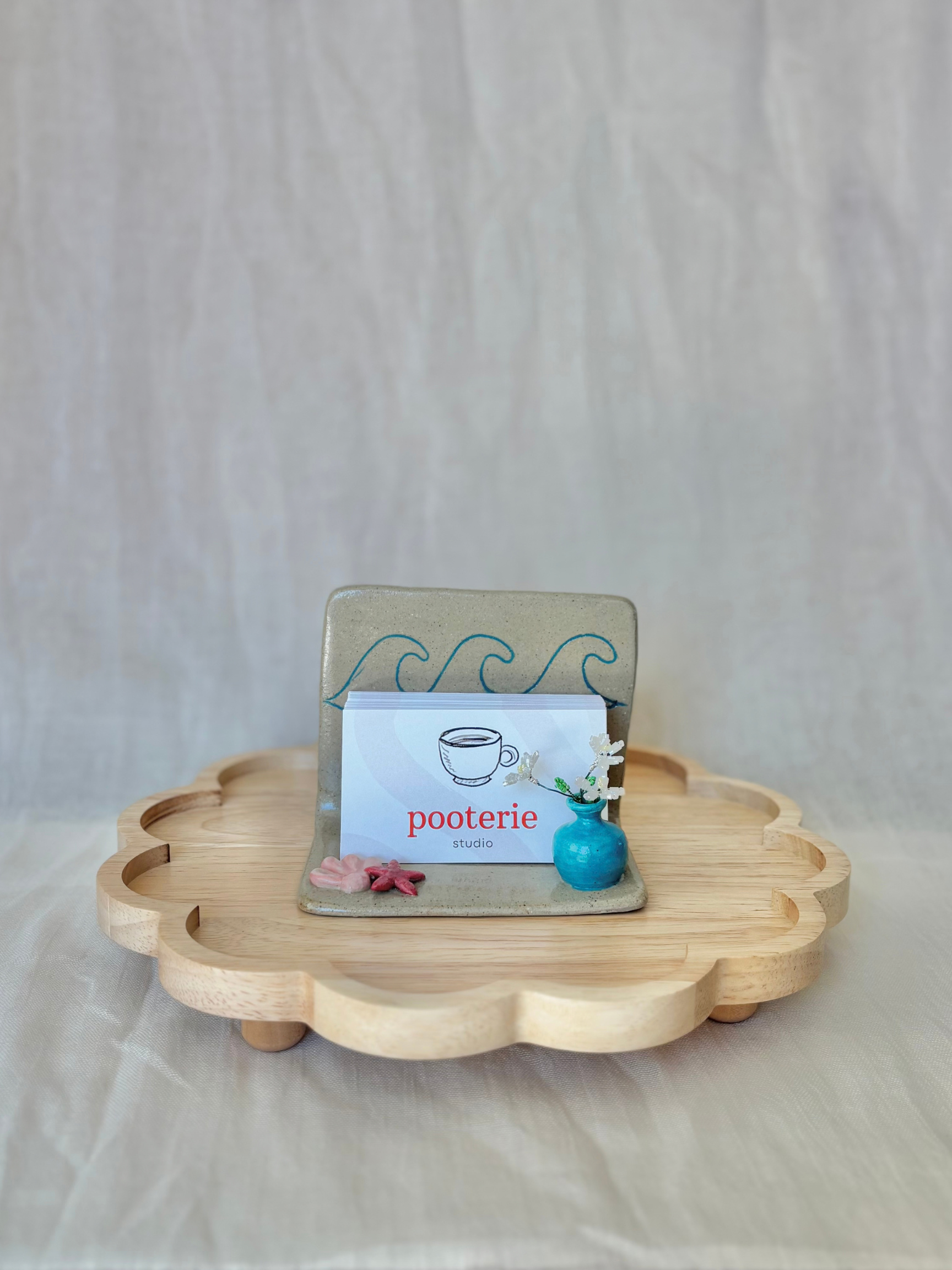 handmade-ceramic-business-card-holder-floral-sculpted-elements.png