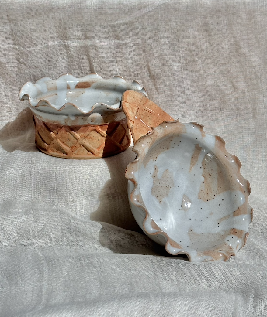 Handmade ceramic salted caramel waffle cup and chocolate brownie waffle cone ice cream bowls on linen.png