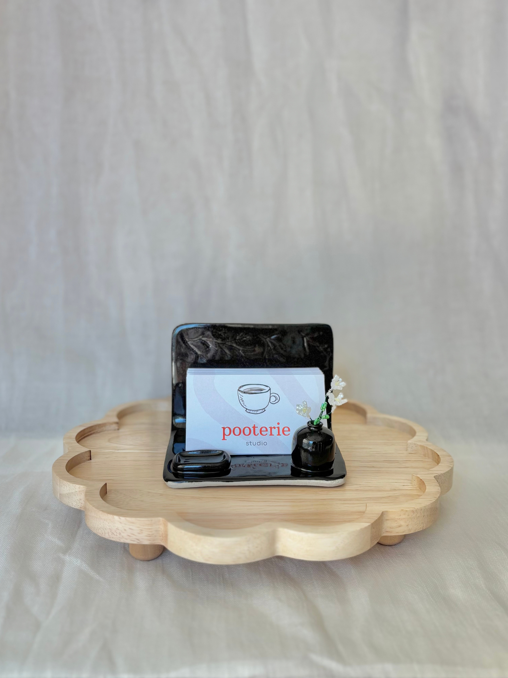 ceramic-business-card-holder-green-glaze-sculpted-details.png