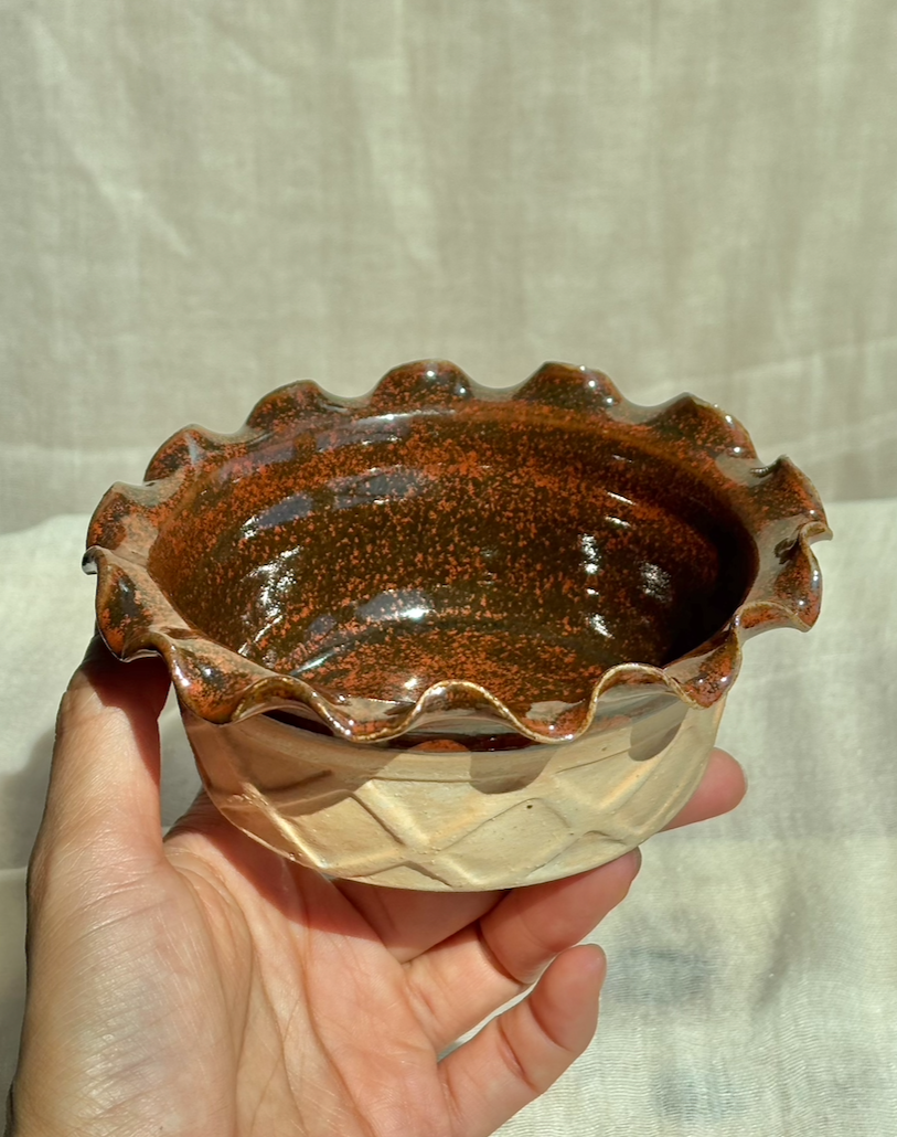 Handmade+ceramic+chocolate+brownie+waffle+cup+ice+cream+bowl+with+carved+waffle+texture%2C+held+in+hand.png