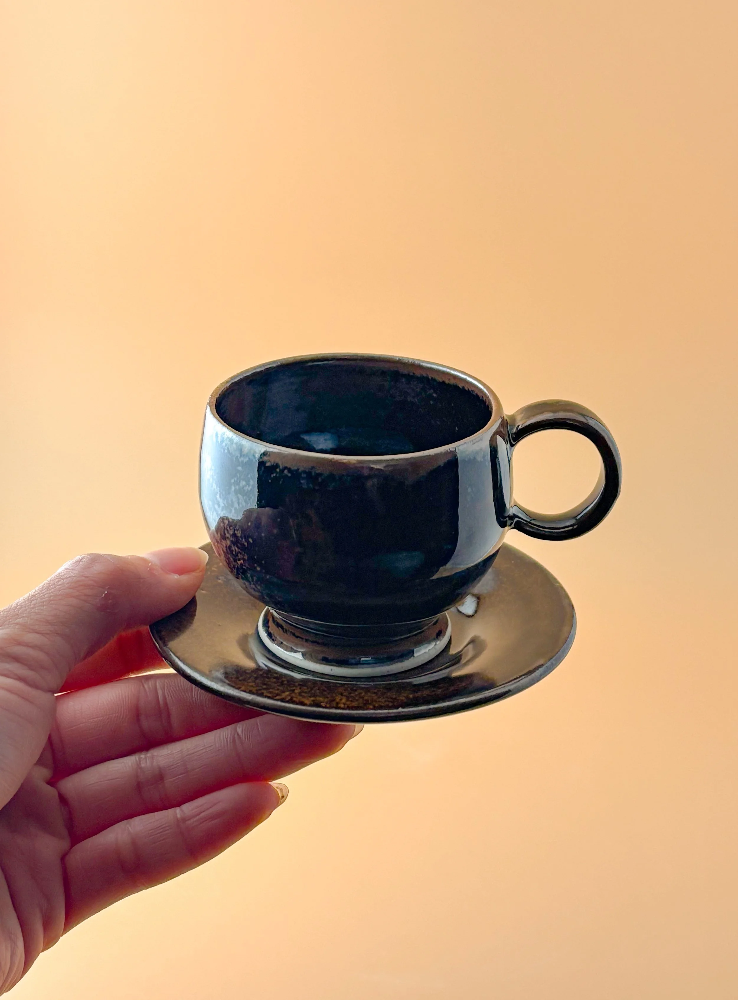dark-brown-espresso-cup-with-saucer.JPG