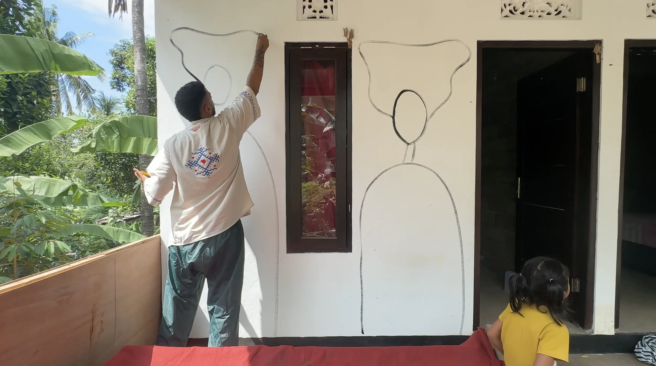 Nothing character wall art painted by Sea Fdol symbolizing presence and unconditional love in a newly built Balinese home