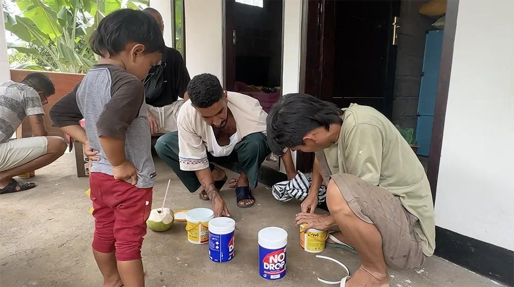 Heal With Sea community building a house for a Balinese family in need during a charity project in Bali