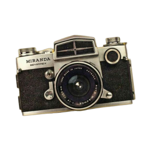 A vintage Miranda camera with a black and silver body, featuring a lens and viewfinder.