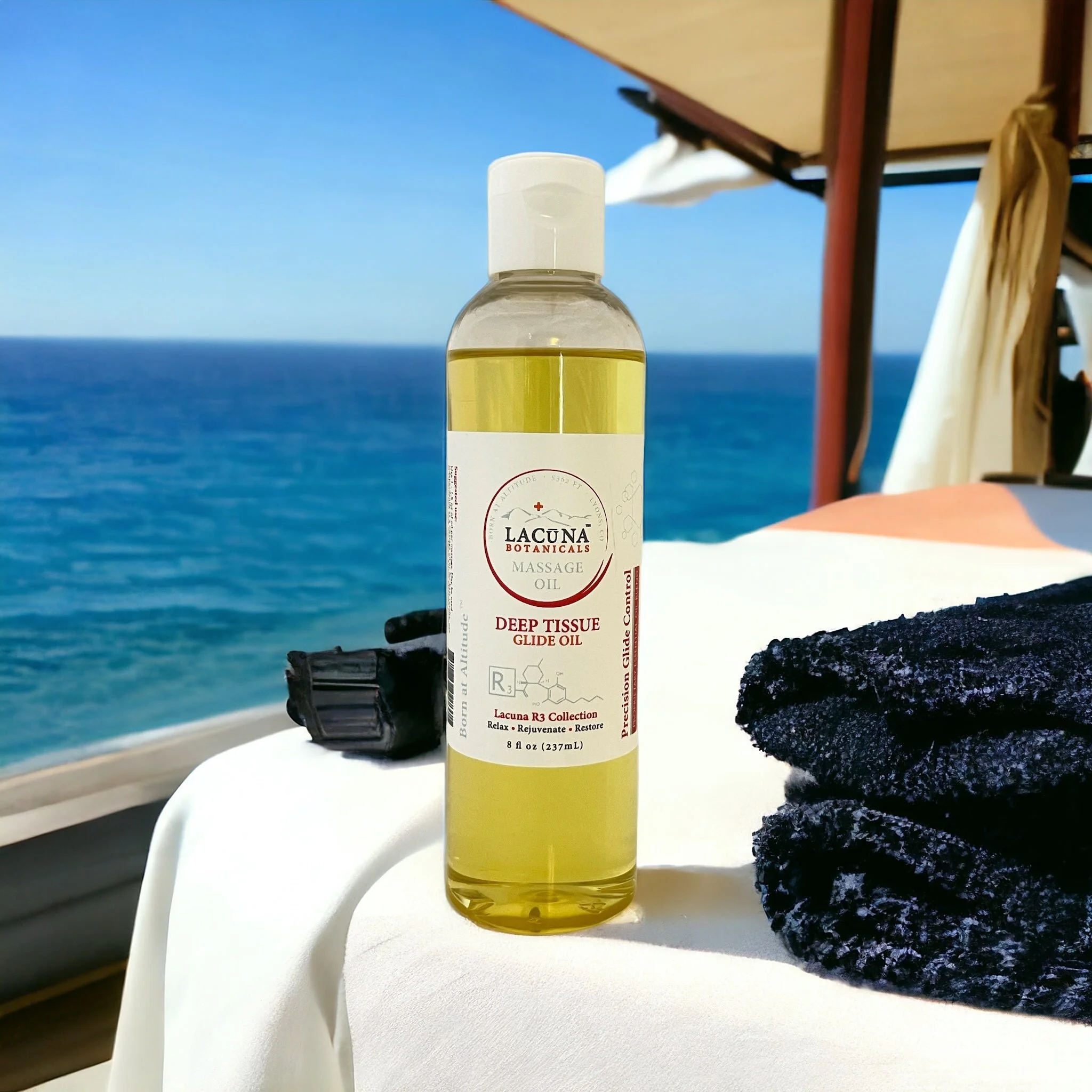 Bottle of Lacuna Botanicals Deep Tissue Glide Oil with CBD used for massage add-ons at Alleviate Sports Massage