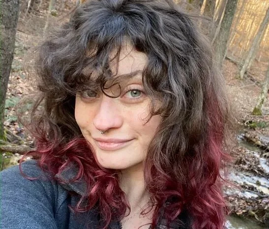 Muranda V., LMT providing deep tissue and cupping at Alleviate Sports Massage in Boulder, CO