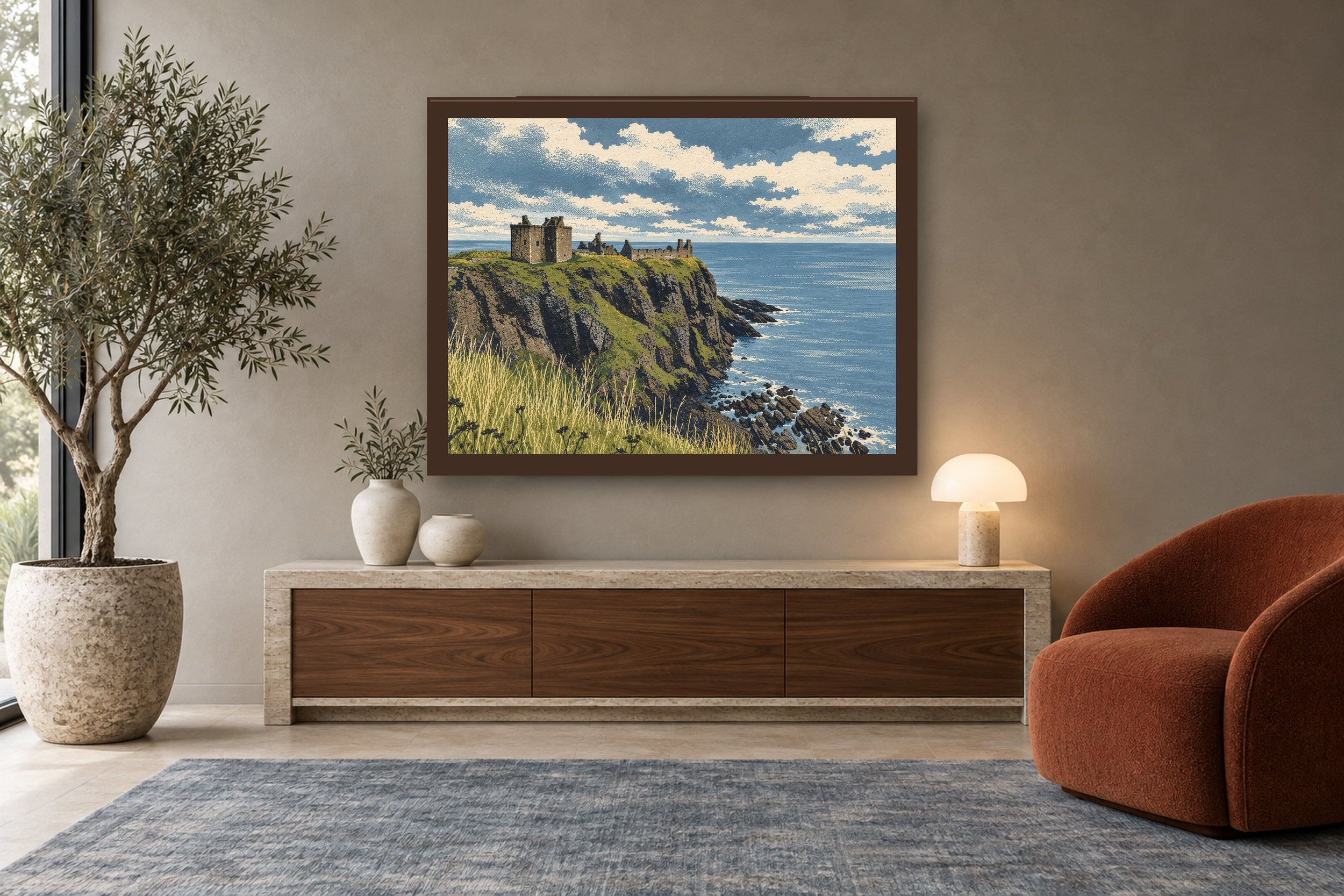 The Keep Above the Sea in the screenprint style, framed above a walnut console in a warm neutral reading room.